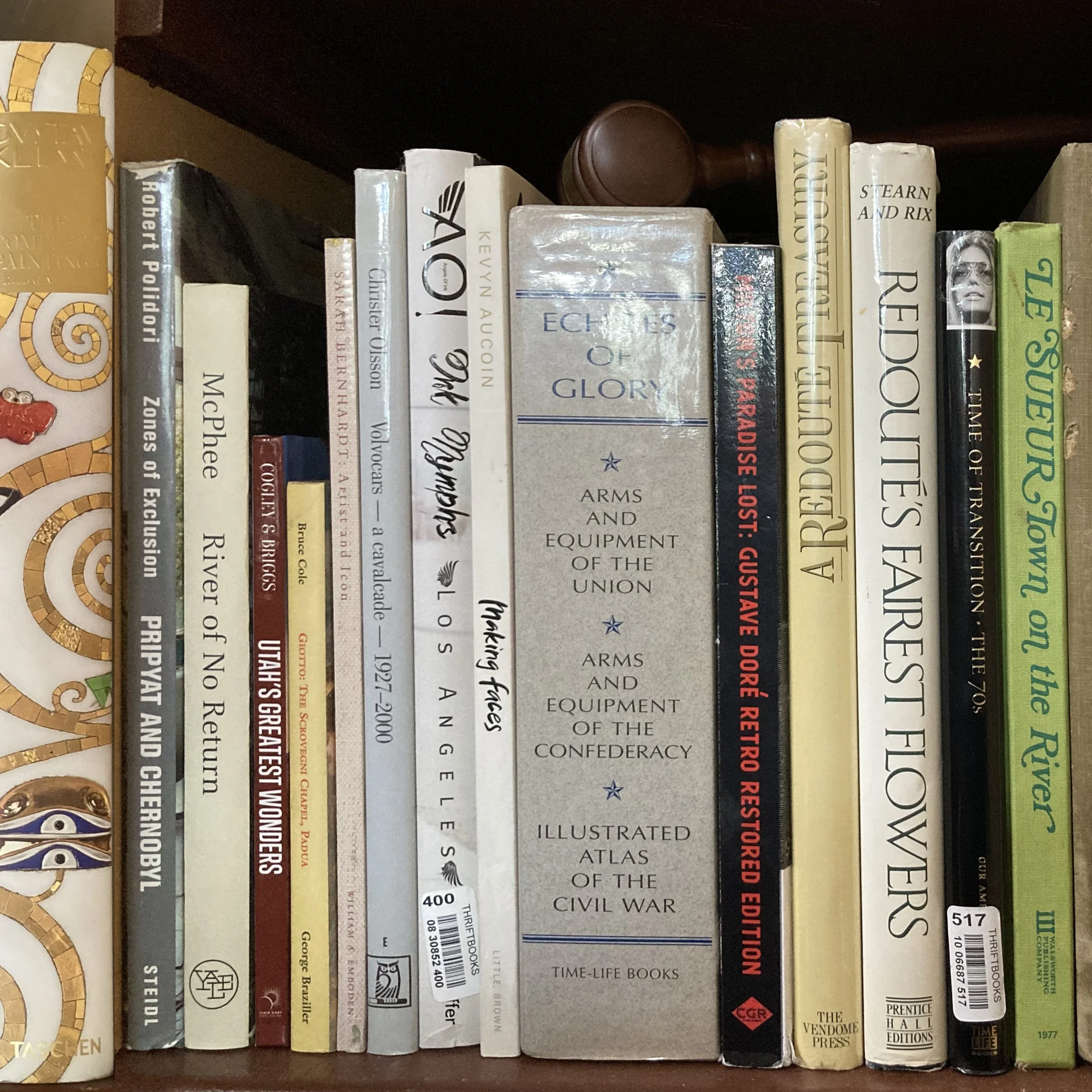 A bookshelf with various books related to history, civil war, and politics. The titles include topics on the Civil War, history of the Confederacy, and historical battles.
