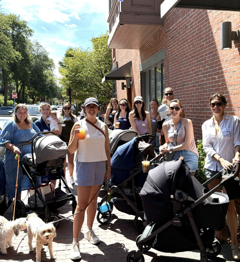 Group of mothers with strollers meeting for South End moms stroller walk with Foundations Pelvic Health.