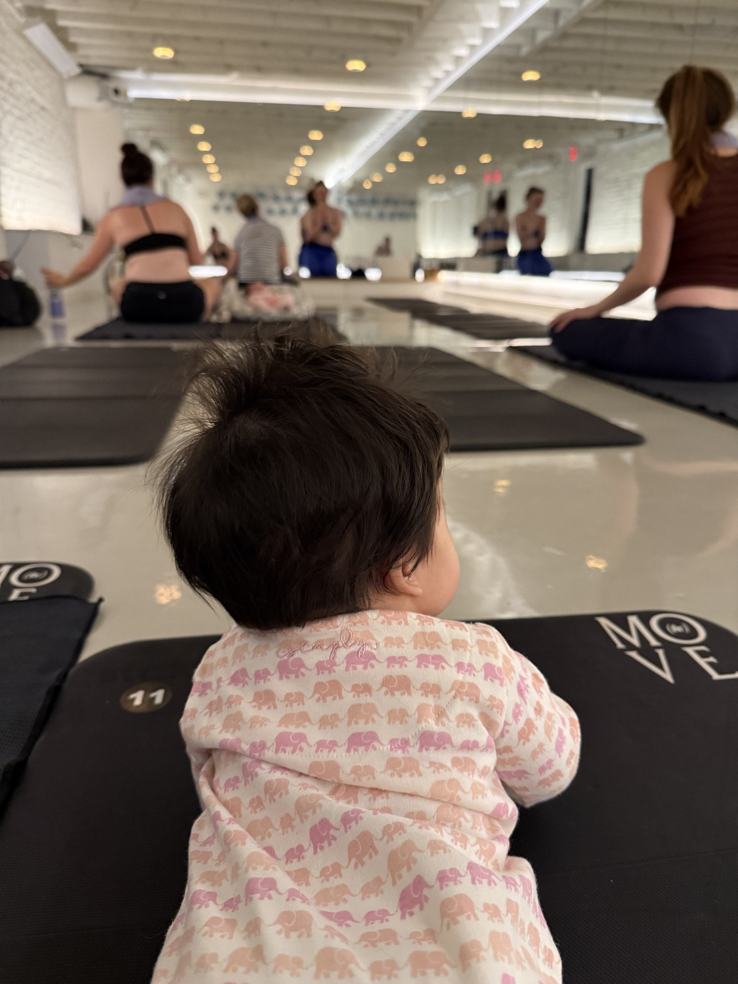 baby at a mom and me pilates class in Boston