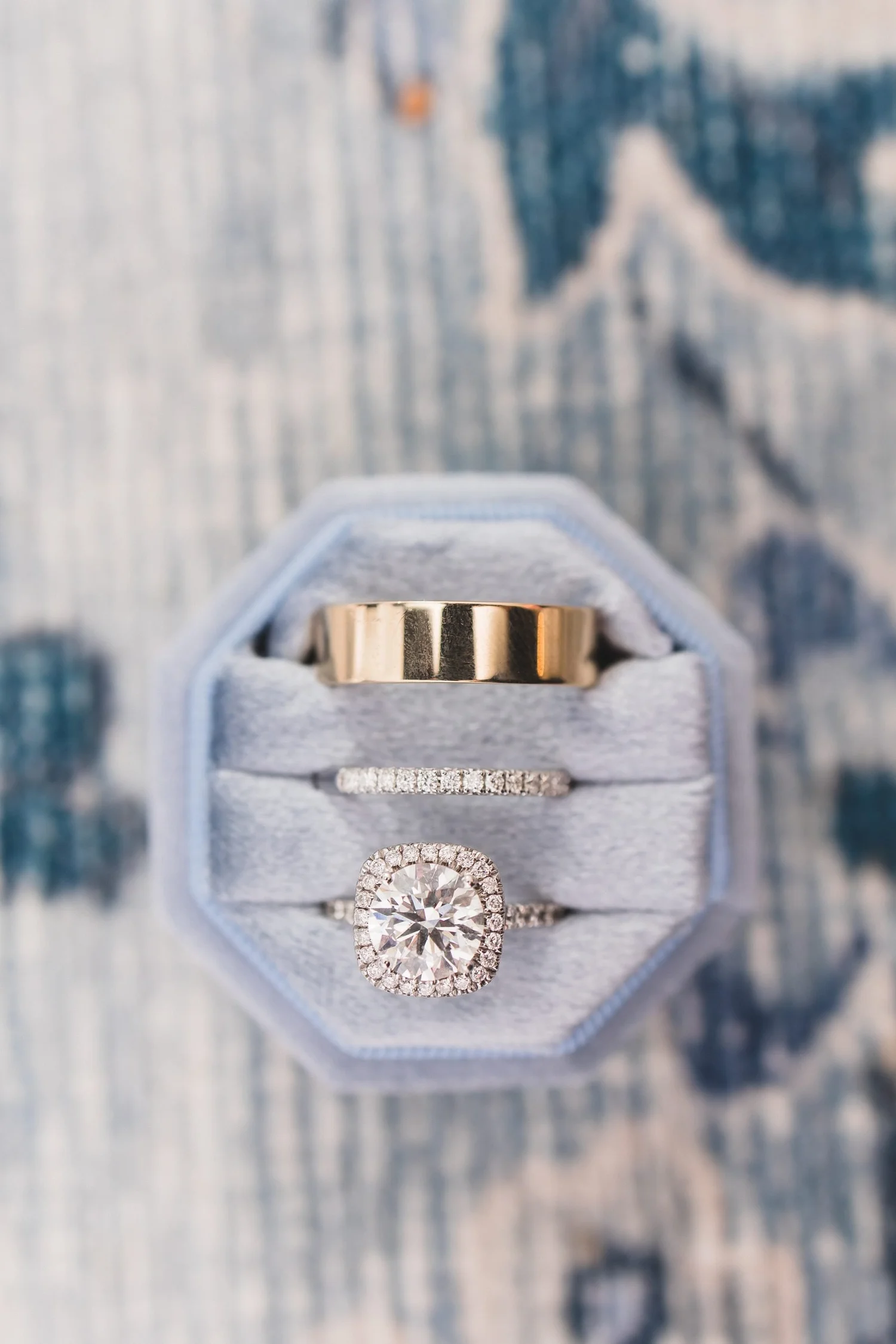 Madison and Derek's wedding rings in a ring box.