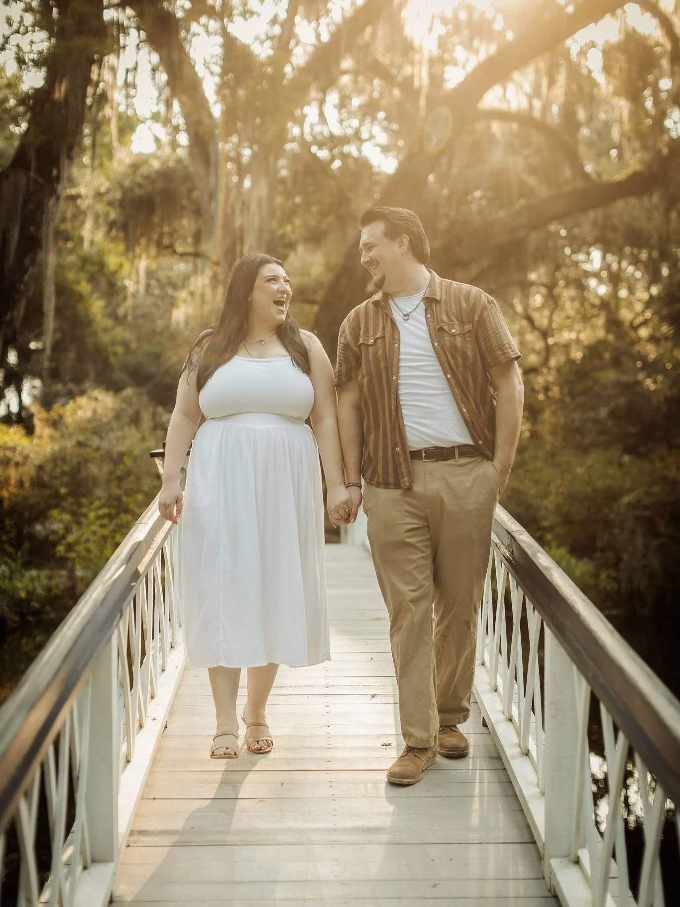 This awesome couple is announcing their engagement from the Spanish Moss Oak trees of magnolia plantation in Charleston, SC!