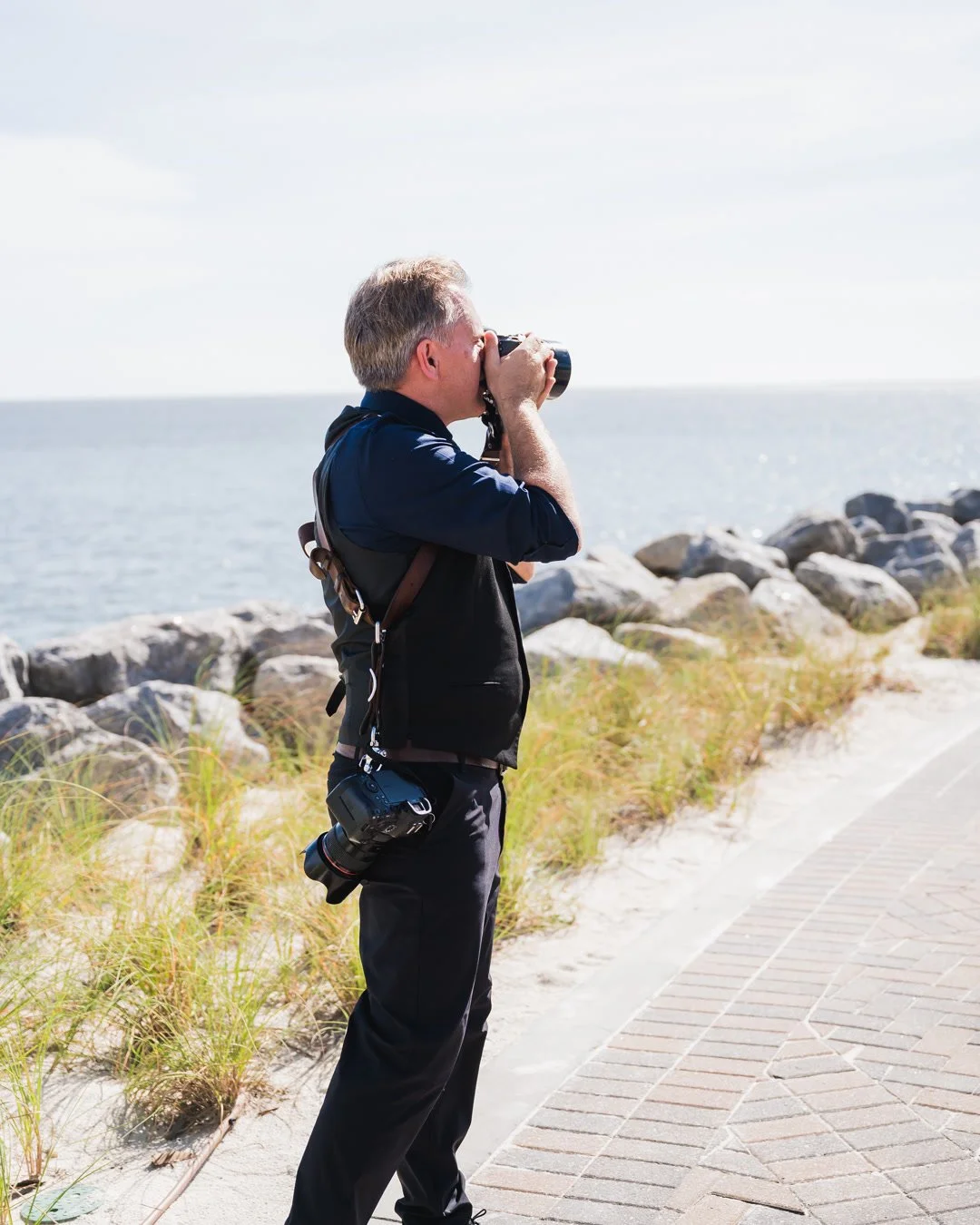 Meet Serg, our lead photographer in Charleston! Here he is behind the scenes at Seabrook Island Country Club, where he has a gift for catching the real, in-between moments that make your day yours. Check your date at storiesandstills.com!

#charlesto
