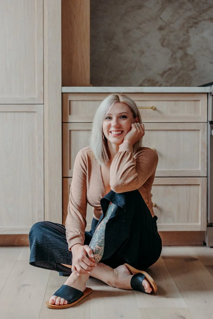 Korinna from Align Your Shelf, one of the local professional organizers in New Hampshire, pictured during an in-home organizing project.