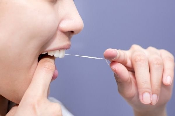 Floss your teeth regularly
