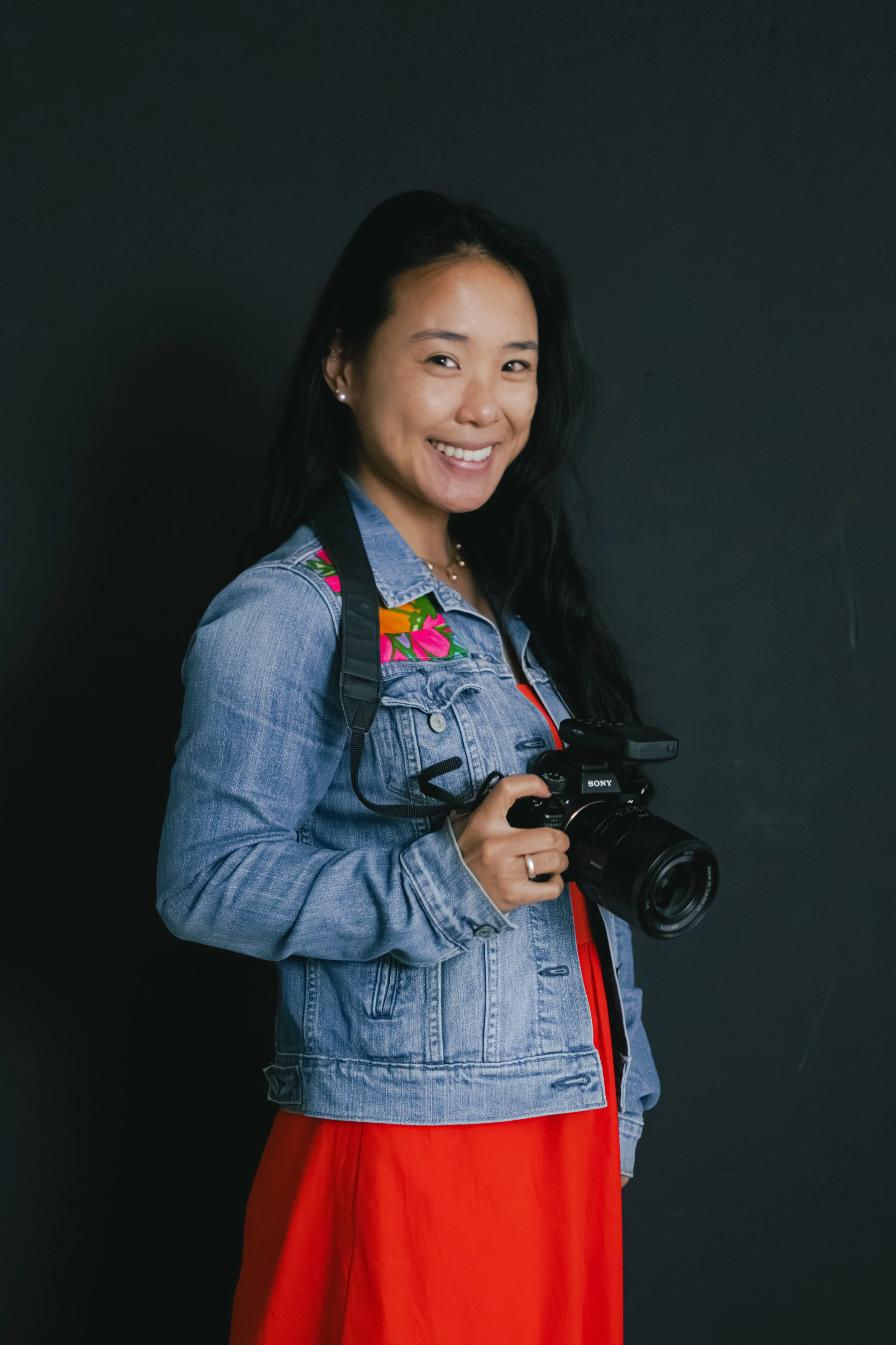 image of girl holding camera