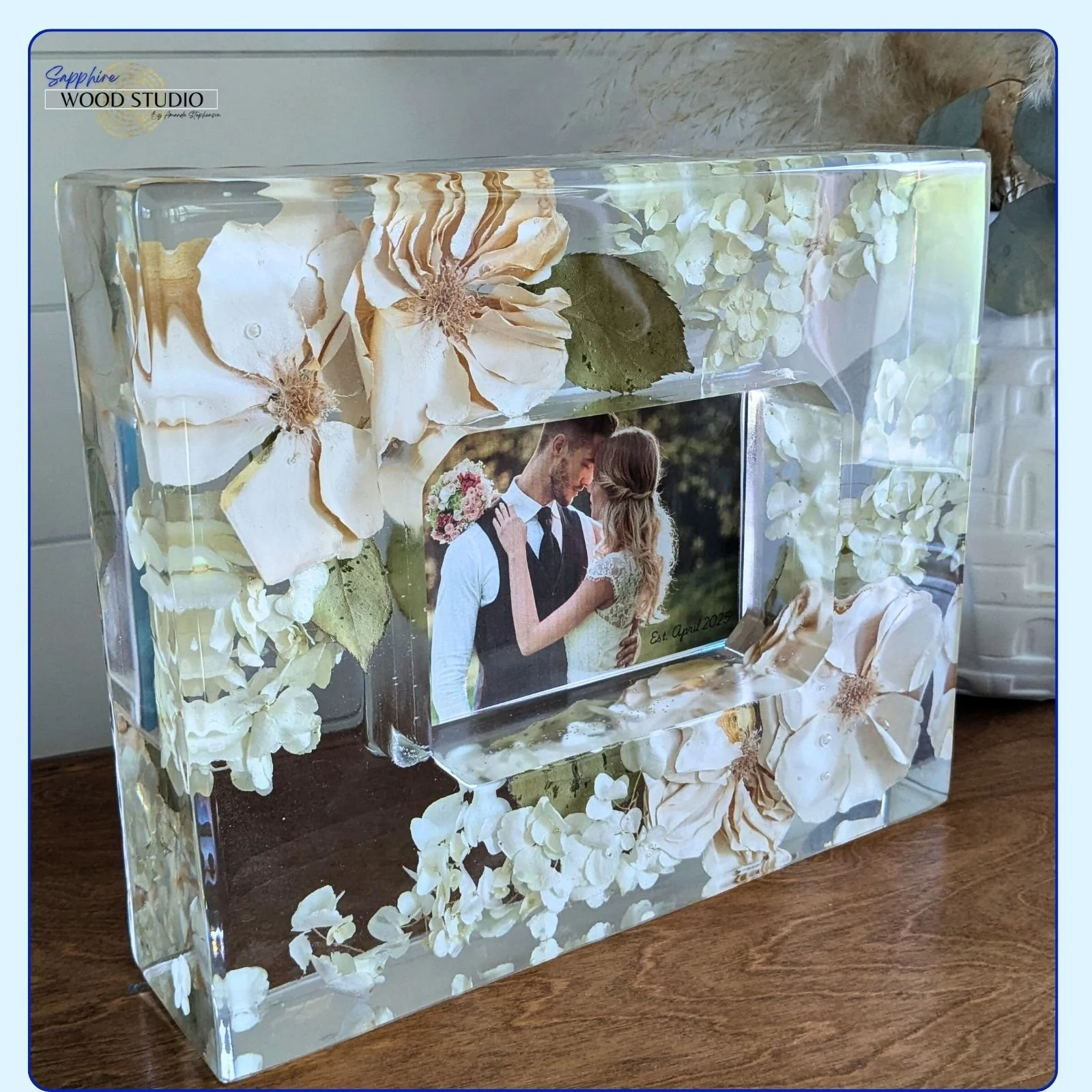 White hydrangeas and roses with a little bit of green. Gettin' pretty good at these wedding flower frame boxes. 🥰
