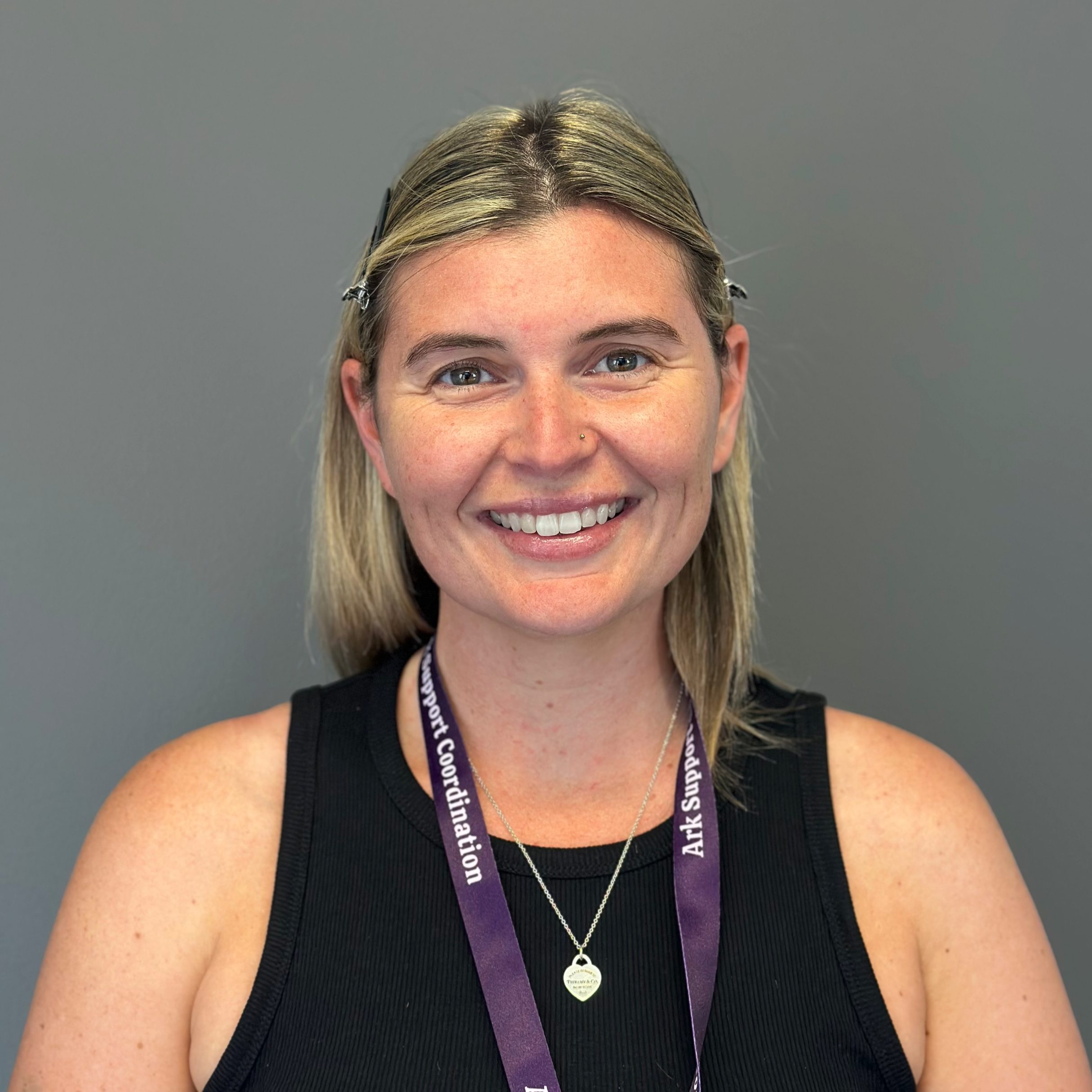 A light purple circle with an illustration of a person's profile.