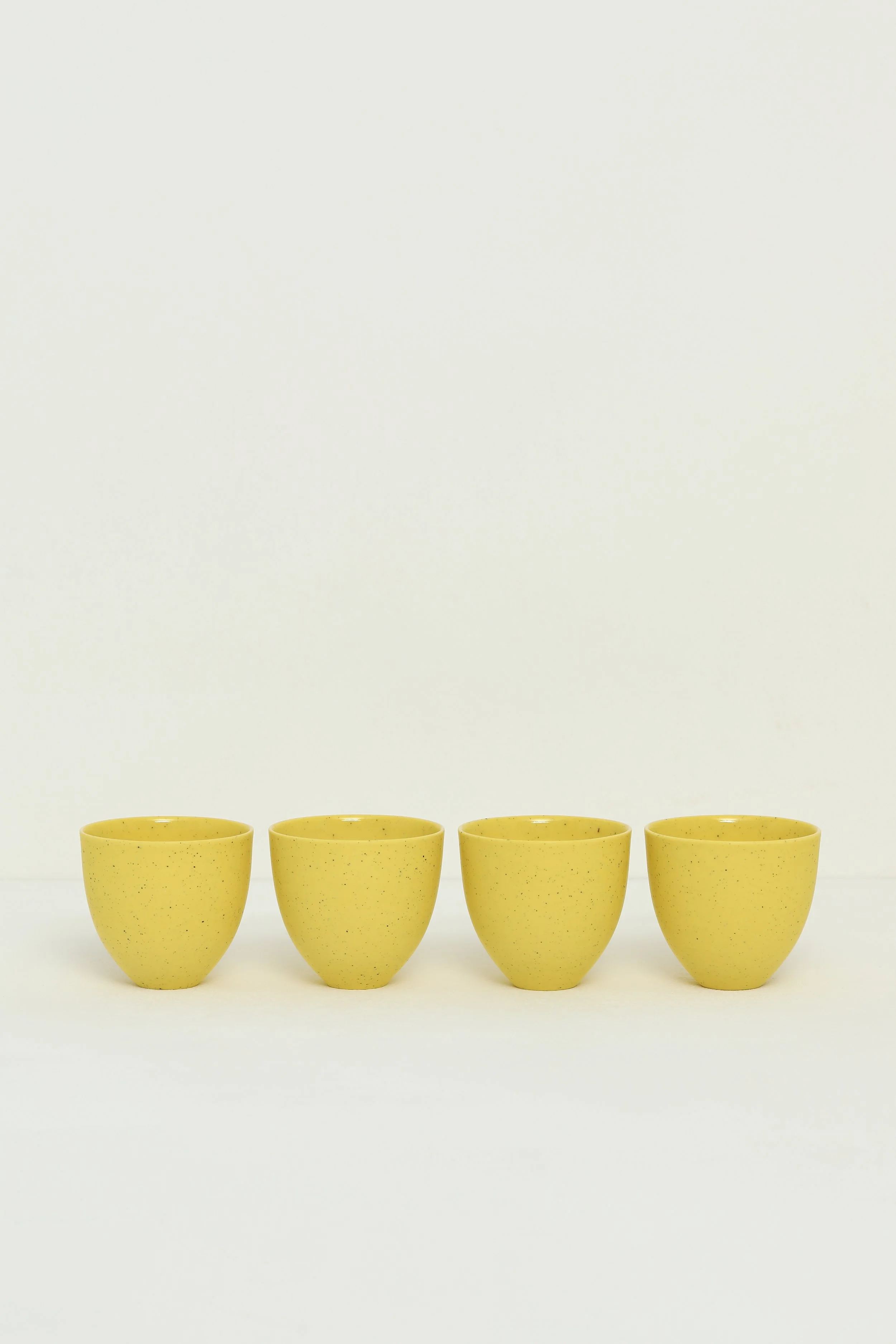32 - 35. Speckled Yellow Bowls
