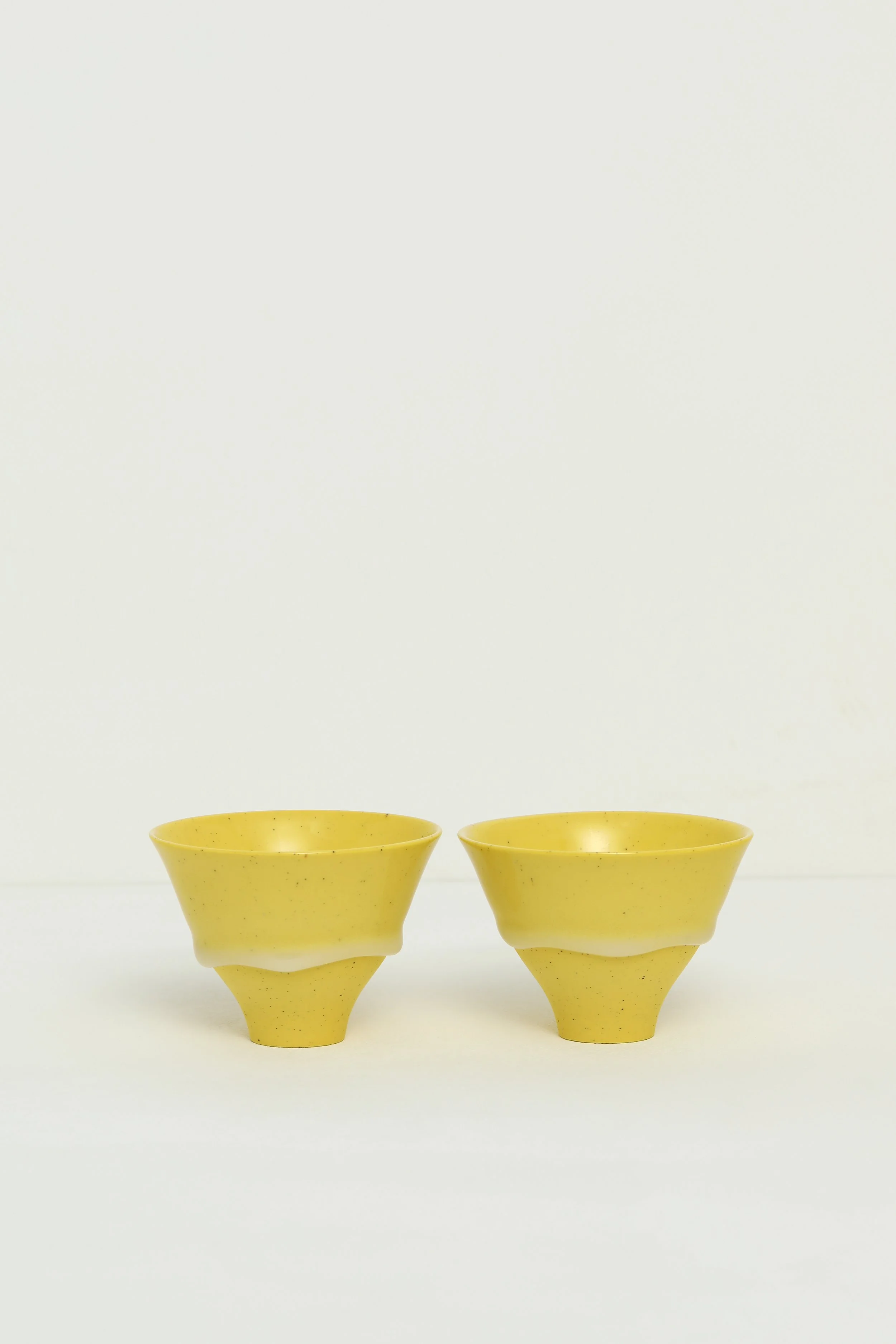 23 & 24.  Speckled Yellow Flared Bowls