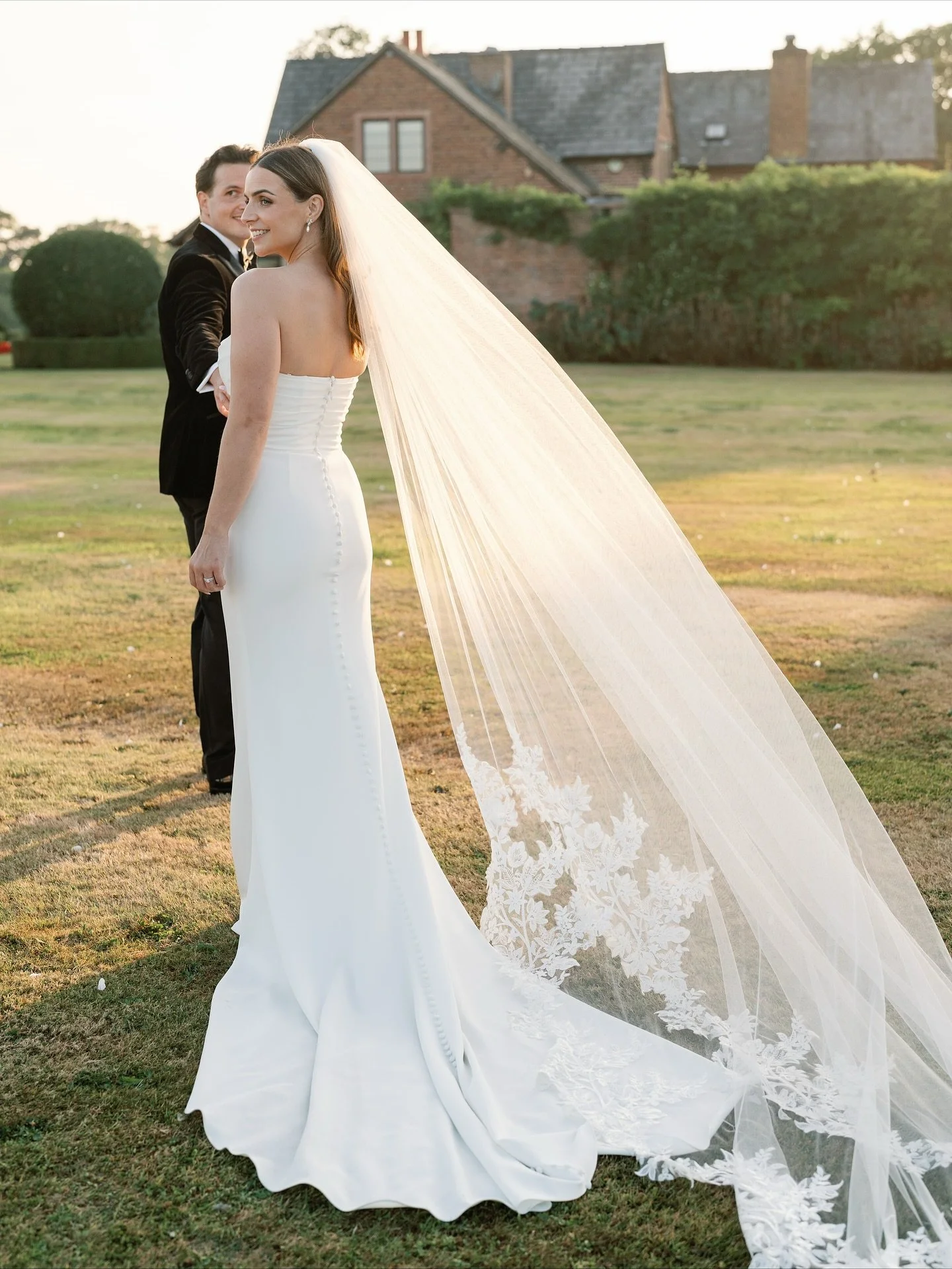 Golden hour moments at the fabulous @merrydalemanor 🤍

Venue: @merrydalemanor
Dress: @madewithlovebridal 
Veil: @theweddingveilshop
HMUA @rebeccaforshaw_hairmakeup 
Shoes @bellabelleshoes 
Flowers  @country_flowers_florist 
Suits @whitfieldandward 
