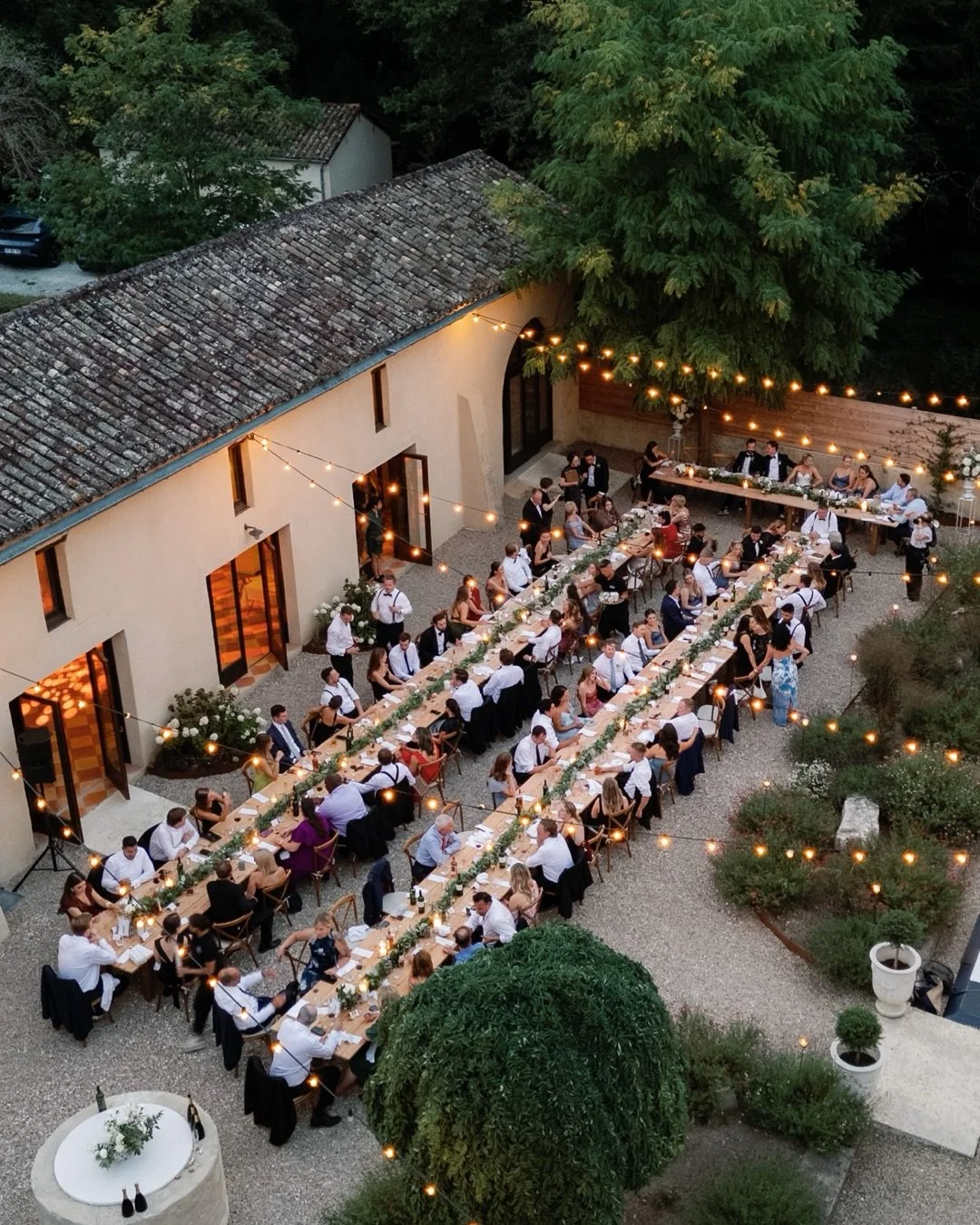 A moment for the guests 🤍

Erin &amp; Alex&rsquo;s guests enjoyed champagne on the sun-drenched terrace of Chateau de Sanse.  Dressed to perfection in timeless tuxedos and shimmering gowns. French wedding magic at its finest.

Venue @chateaudesansew