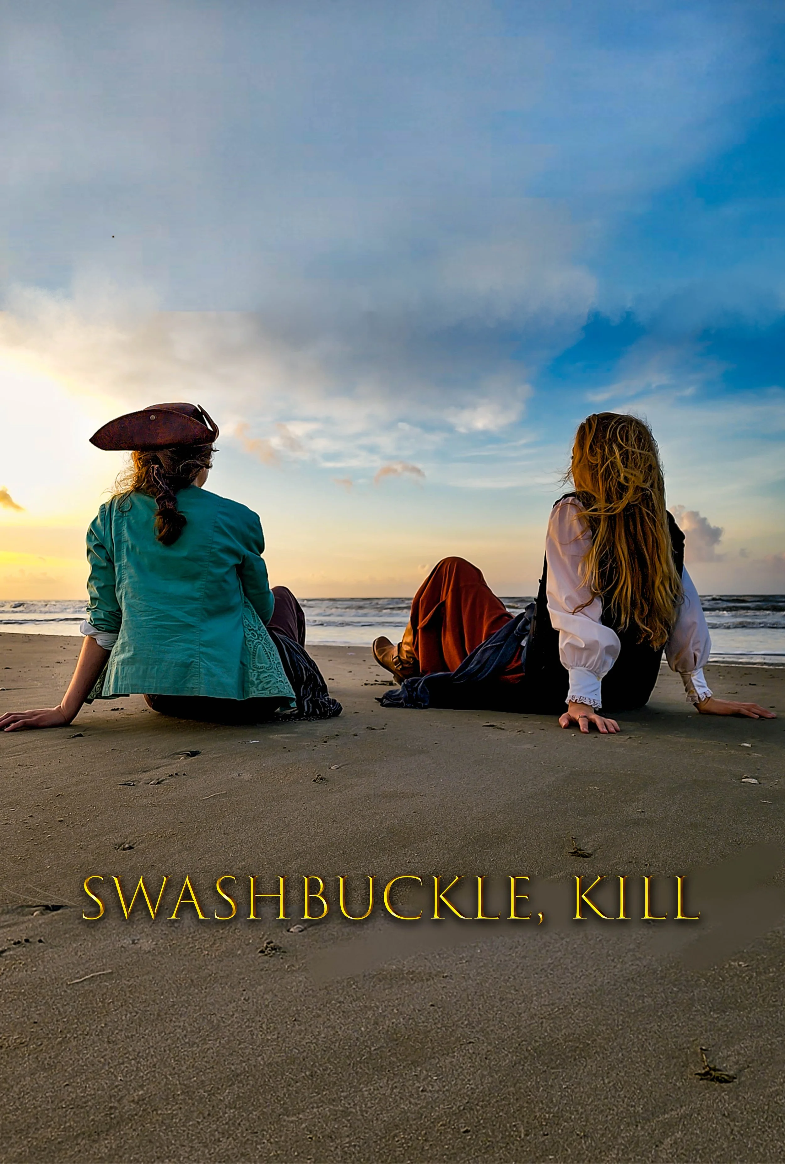 Two women sit on the beach at sunset, facing the ocean, with the sky partly cloudy. One woman has curly blonde hair and is dressed in a white blouse and dark skirt, while the other woman has dark hair and is wearing a teal jacket and a pirate hat. The scene is tranquil and scenic. The text "SWASHBUCKLE, KILL" is overlaid at the bottom of the image in yellow capital letters.