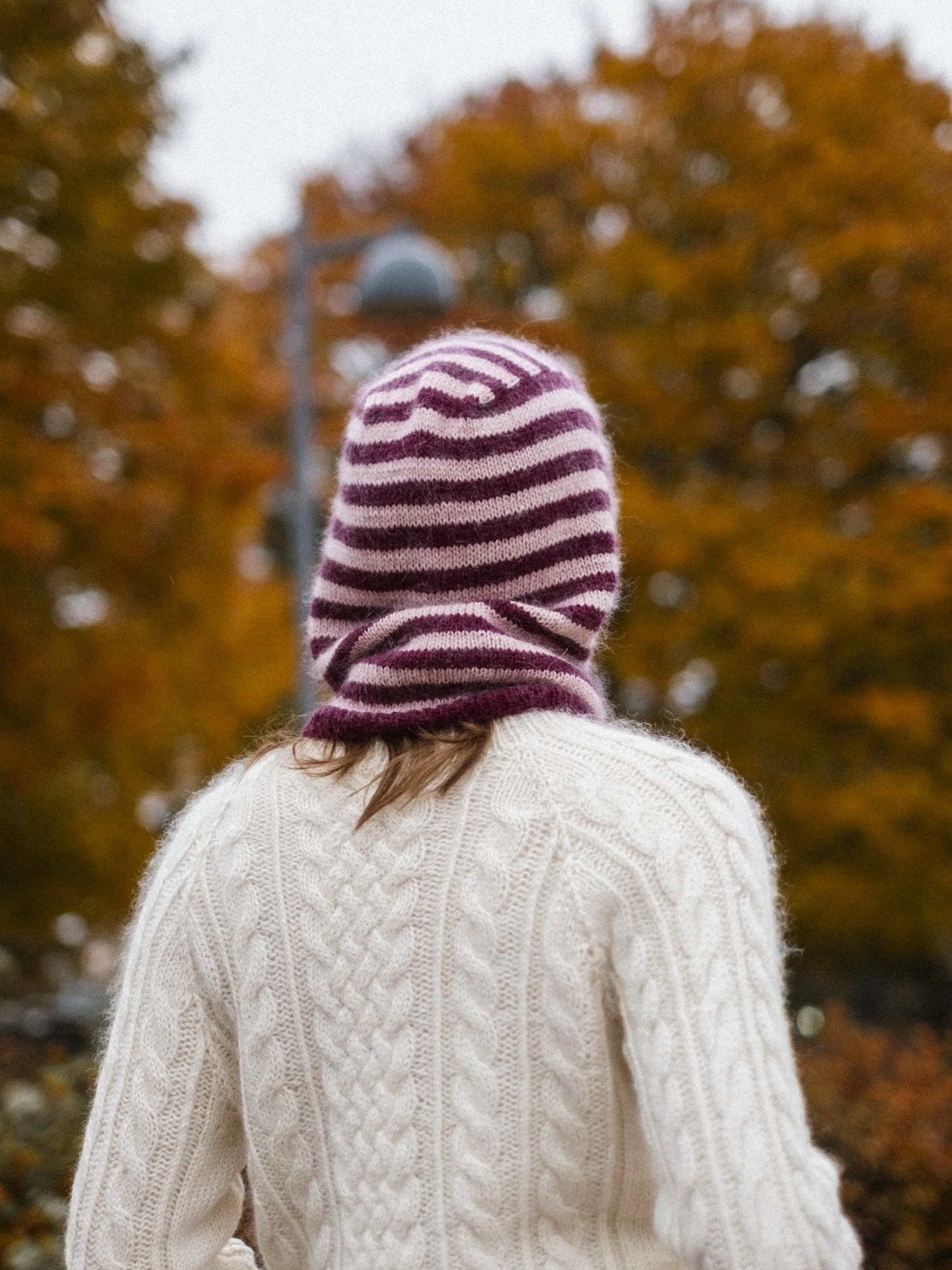 in-my-stripes-era-balaclava-back-view-striped-knit-balaclava-outdoors.jpg