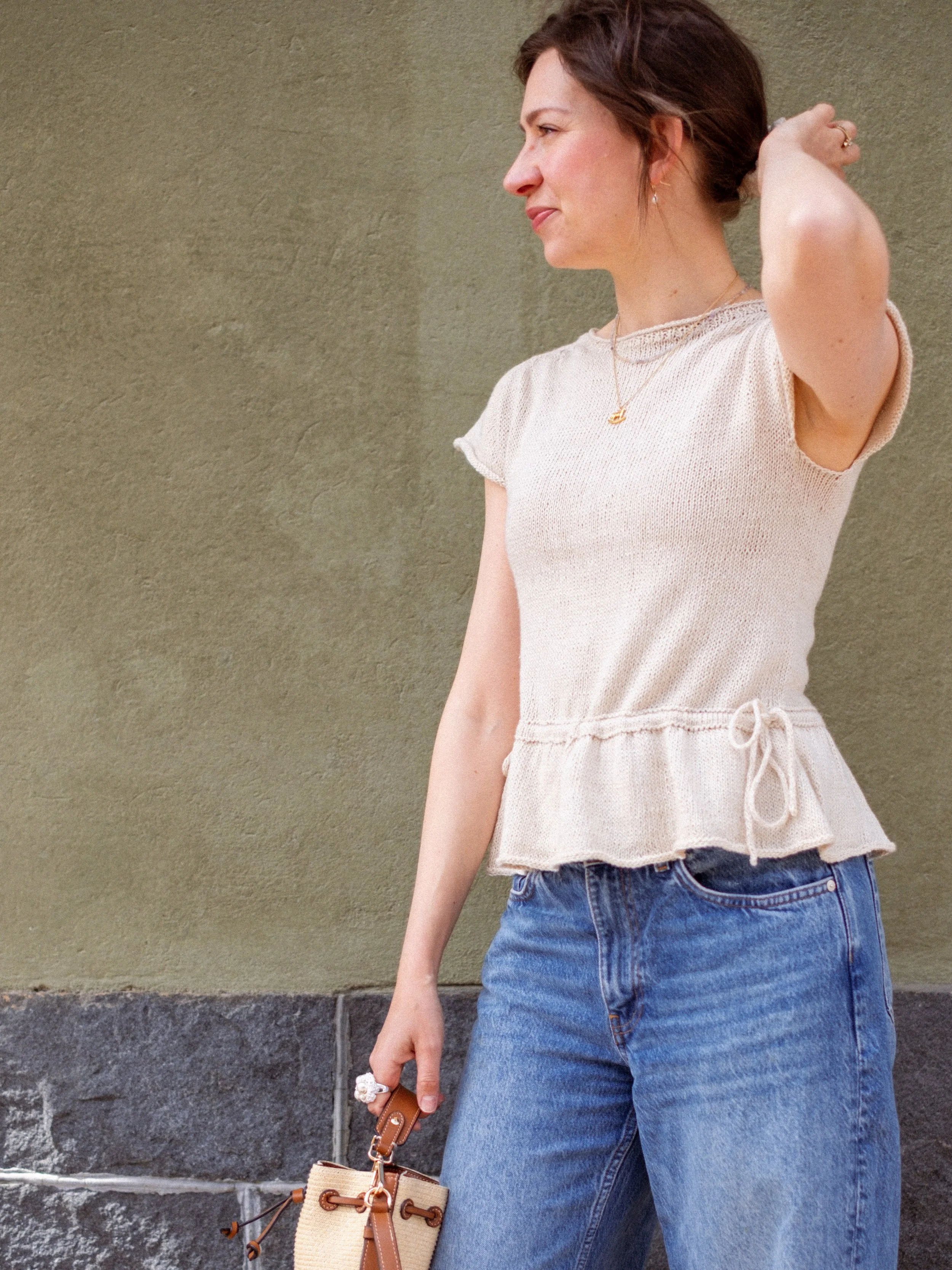 flutterby-top-cream-side-profile-windy-hair.jpg
