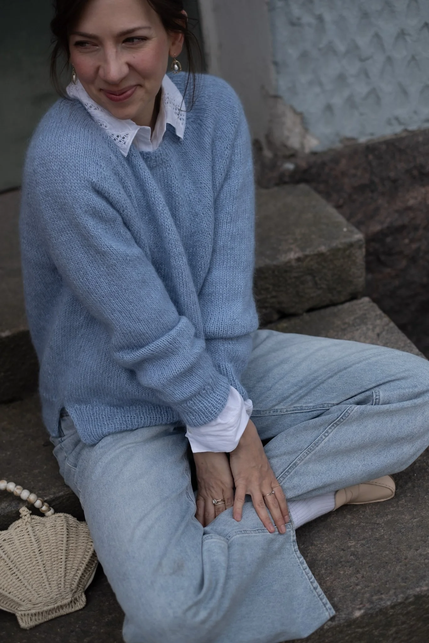 juice-sweater-sitting-front-smiling.jpg
