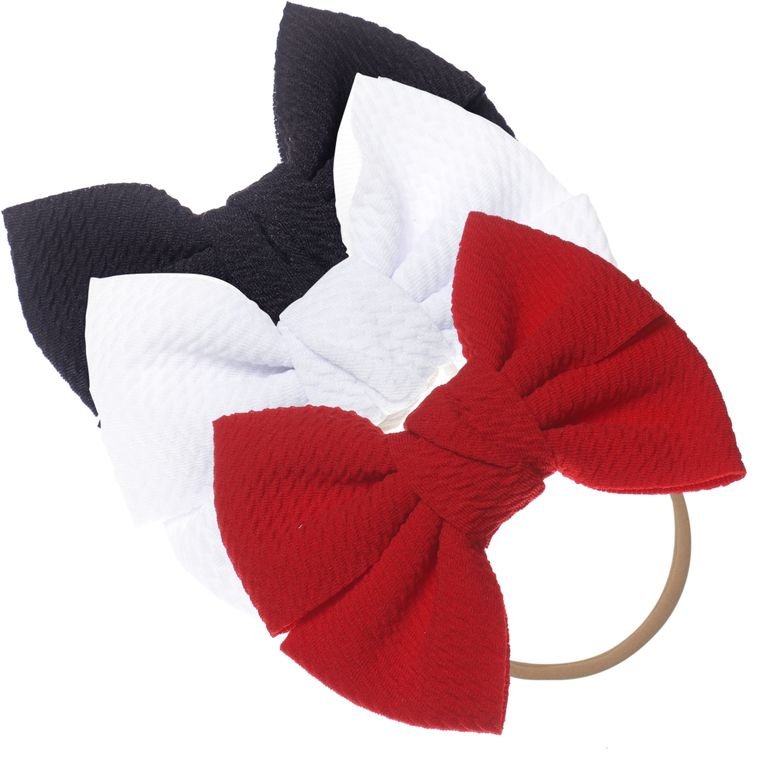 red white black textured bows.jpeg