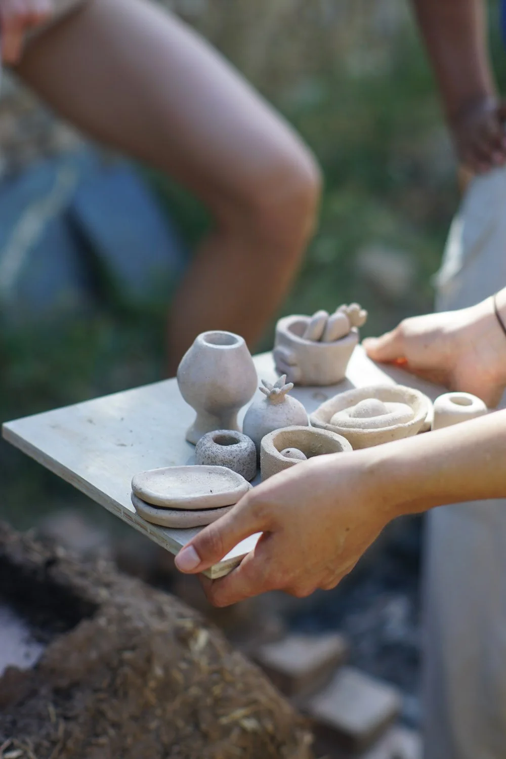 Shaped pots ready to fire at ceramics workshop.jpg (Copy)