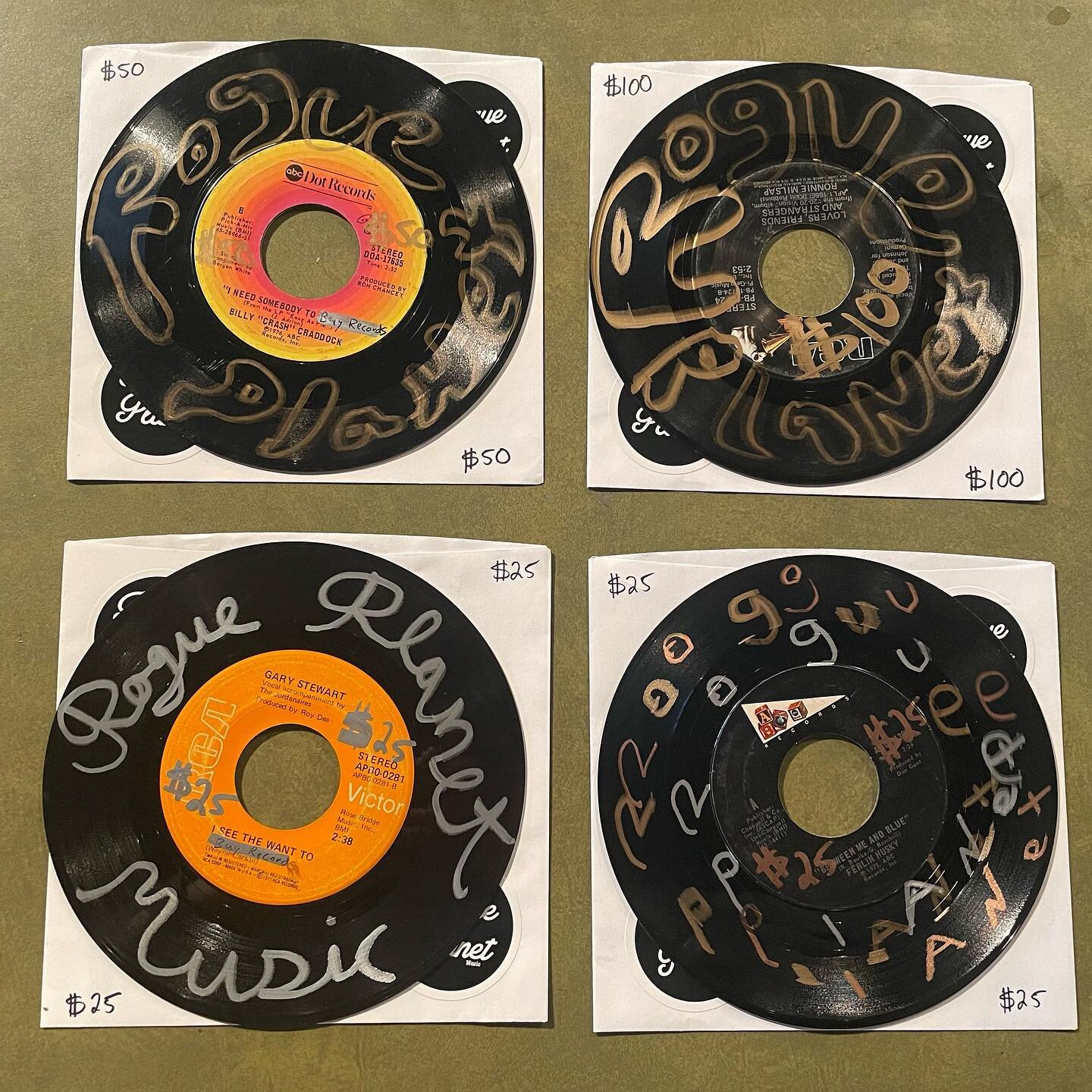 Making Gift Cards today! Double sided designs on upcycled 45s. We also have E gift cards available (DM to request link!) #upcycling #giftcertificatesavailable #45rpm #desmoines #dsmia #paintmarkers #lettering