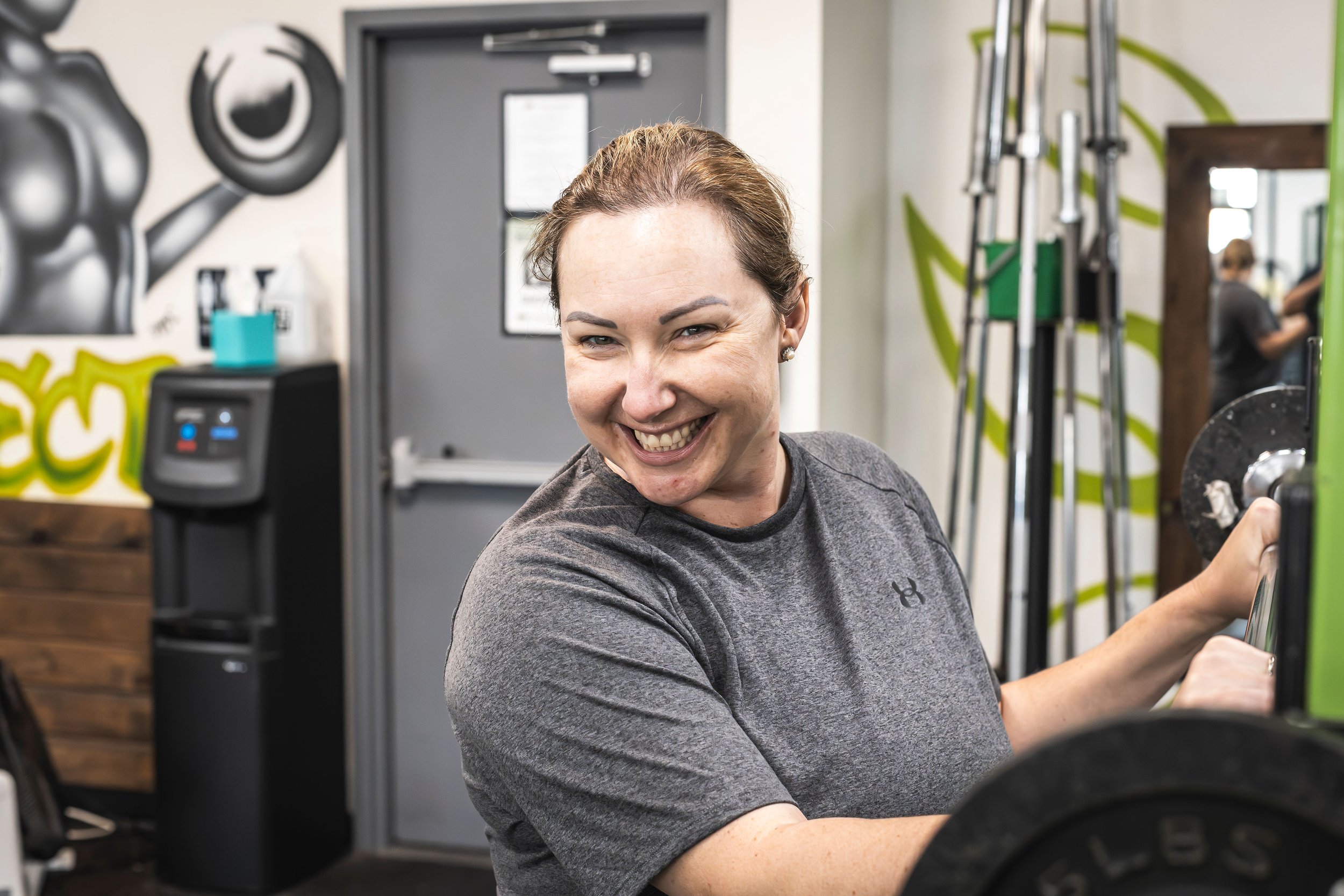 Image of a smiling PFP gym member.