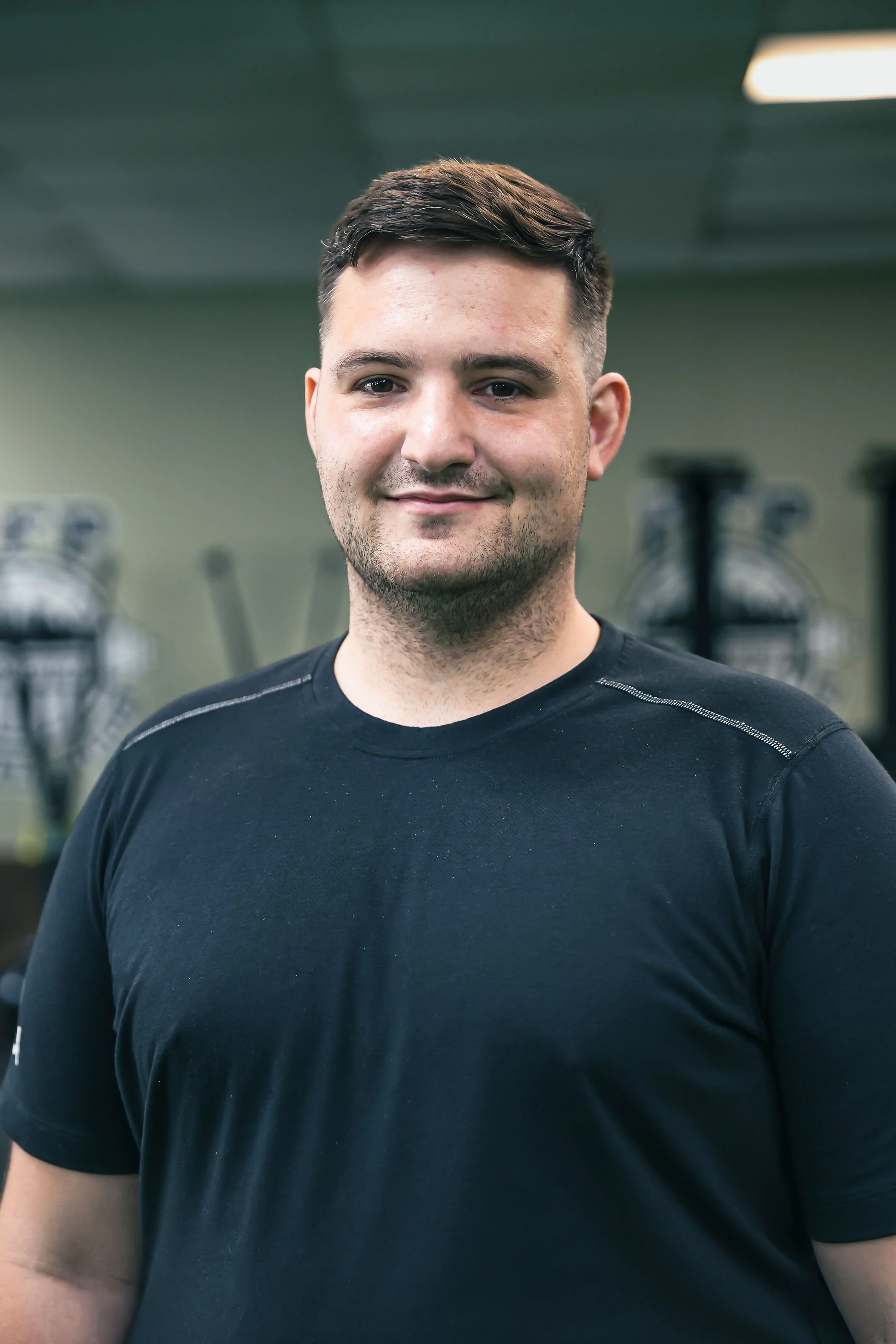 Headshot of Trainer and Group Instructor, Devan Bennett.