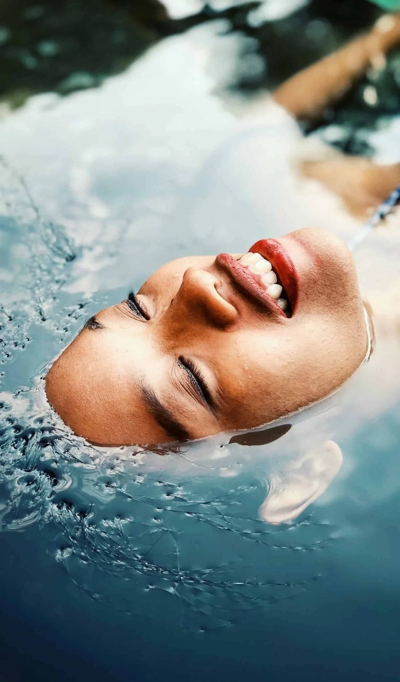 woman relaxing in lake