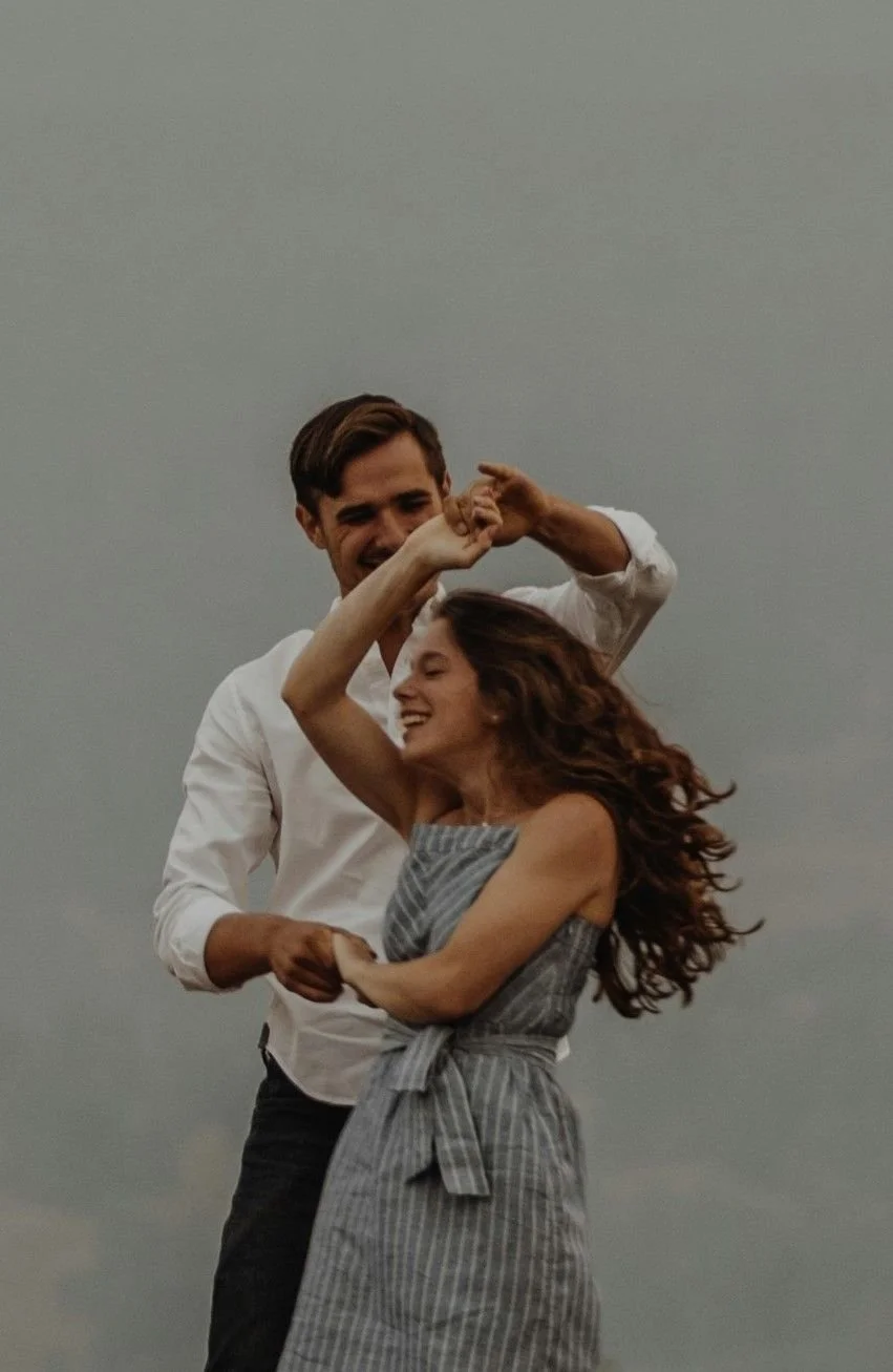 couple dancing on the beach