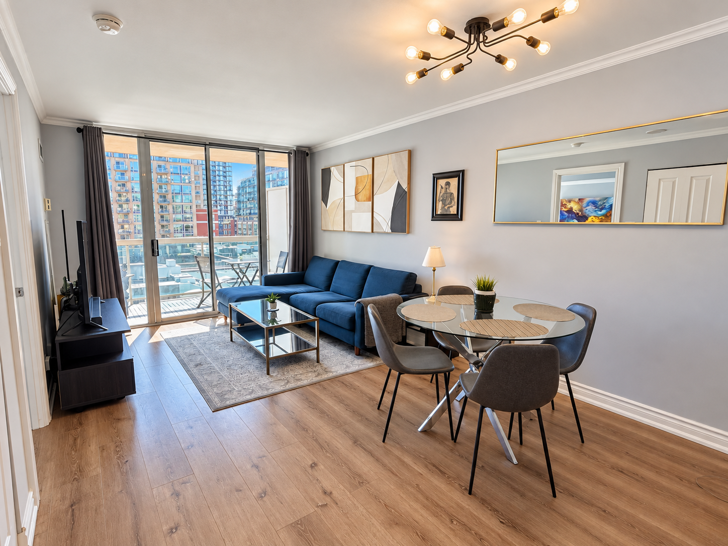 Bright Modern Condo Living Room with Balcony Views.png