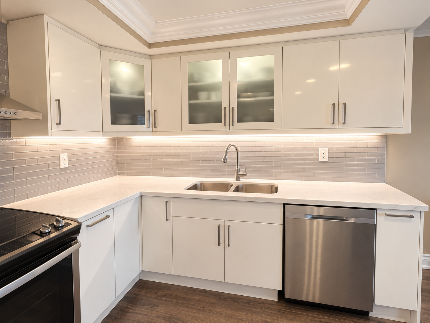Modern White Kitchen with Marble Countertops.png