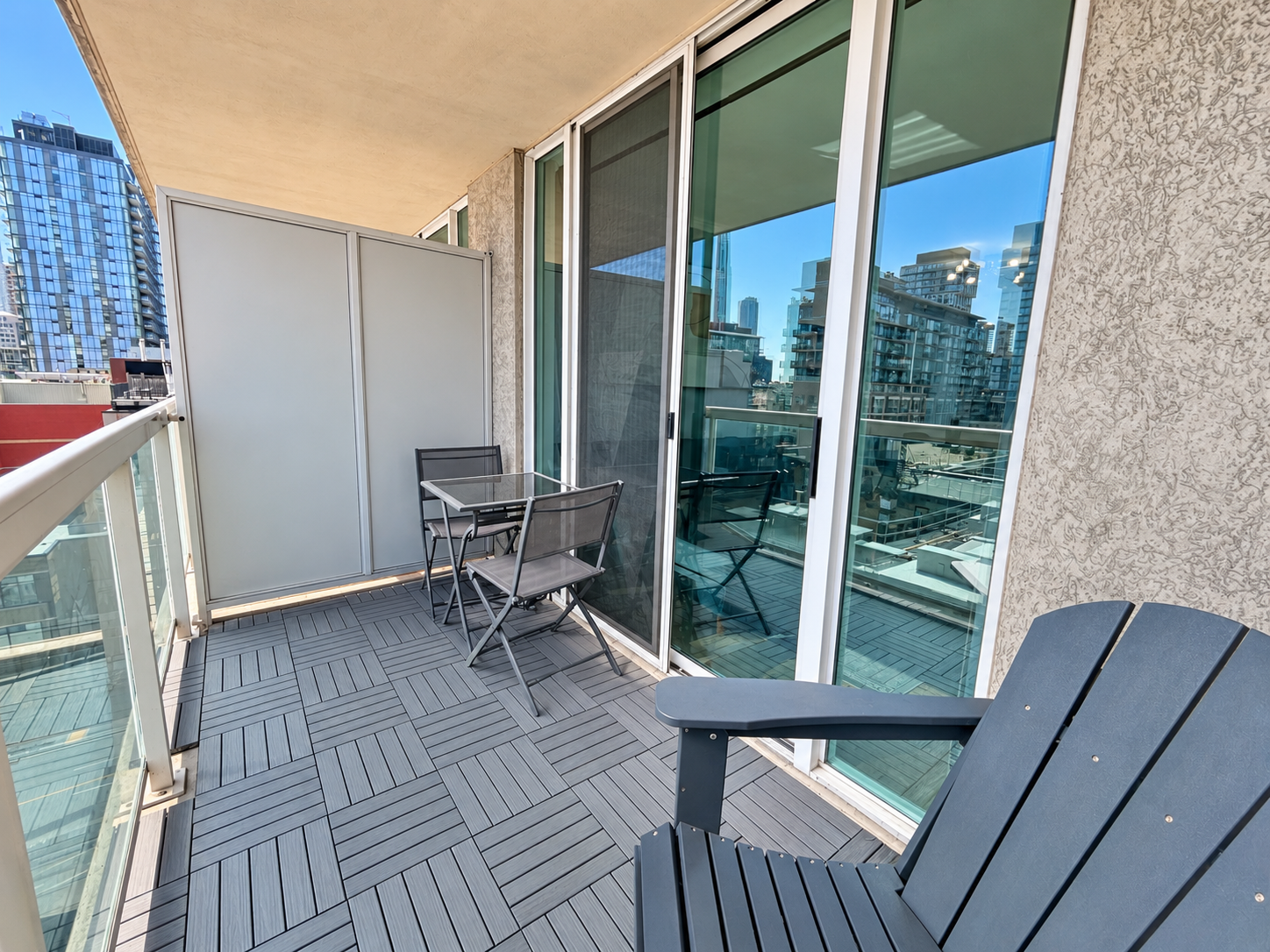 Modern Condo Balcony Overlooking the City.png