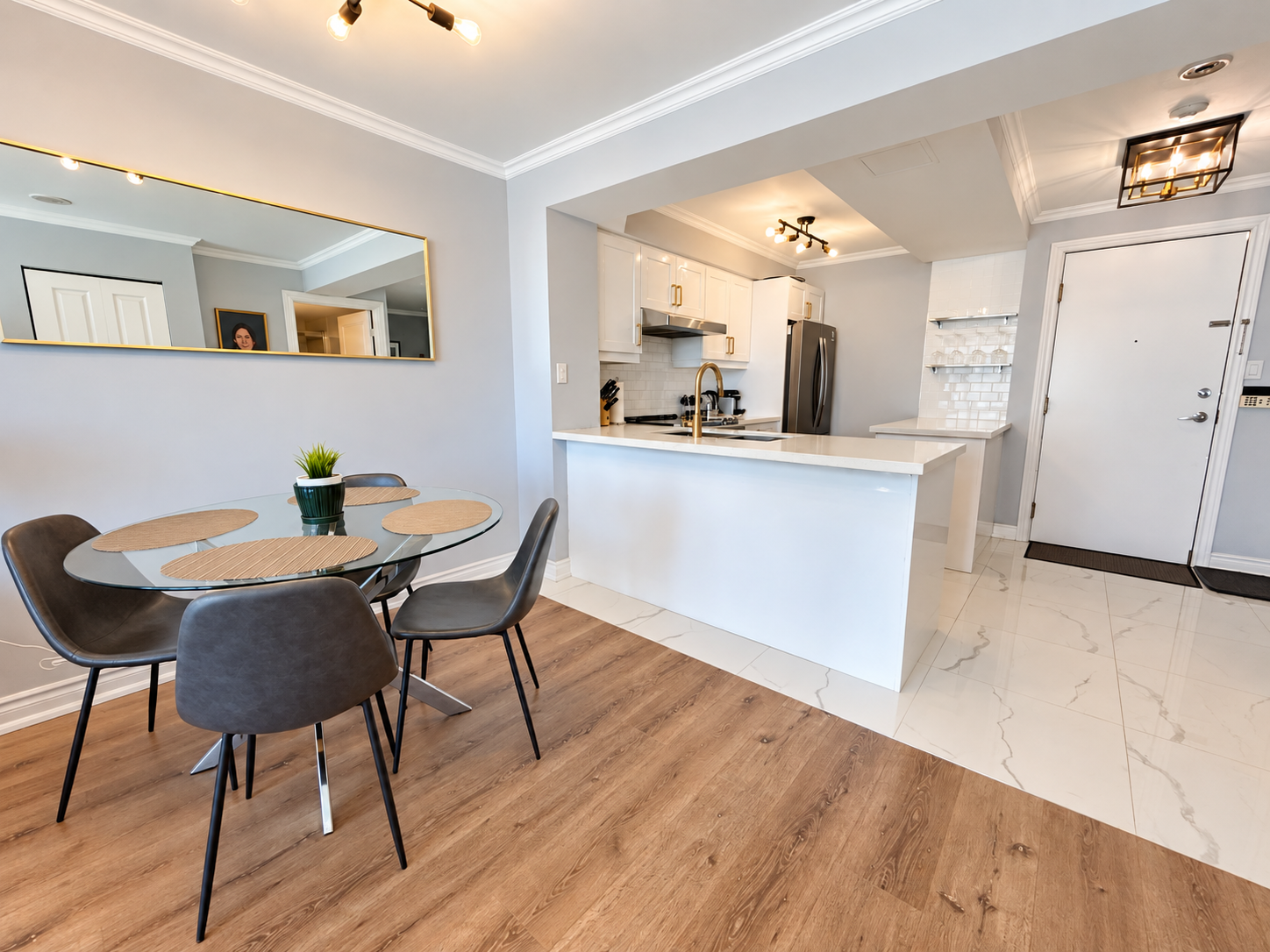 Bright Modern Condo Dining and Kitchen.png
