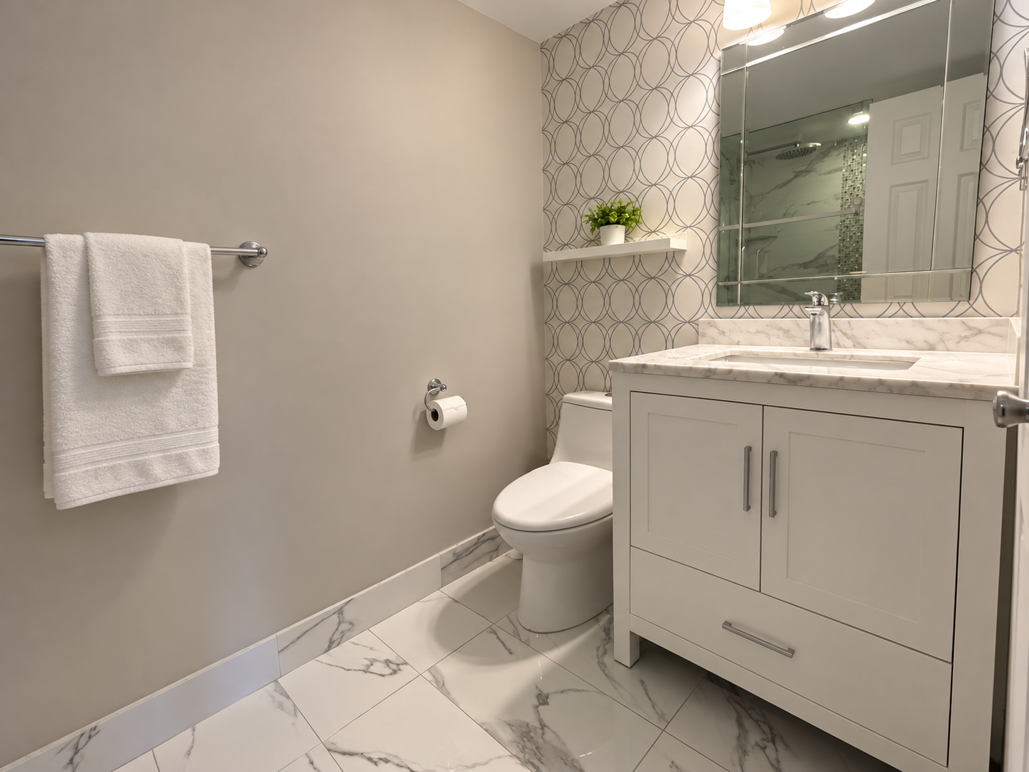 Modern Greige Bathroom with Marble Accents.png
