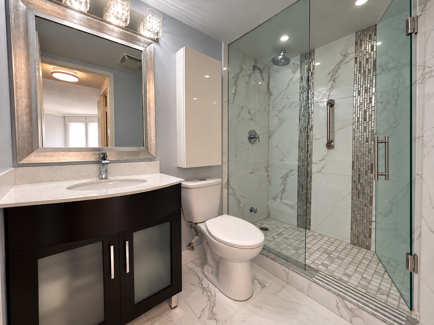 Modern Marble-Tile Bathroom with Glass Shower.png