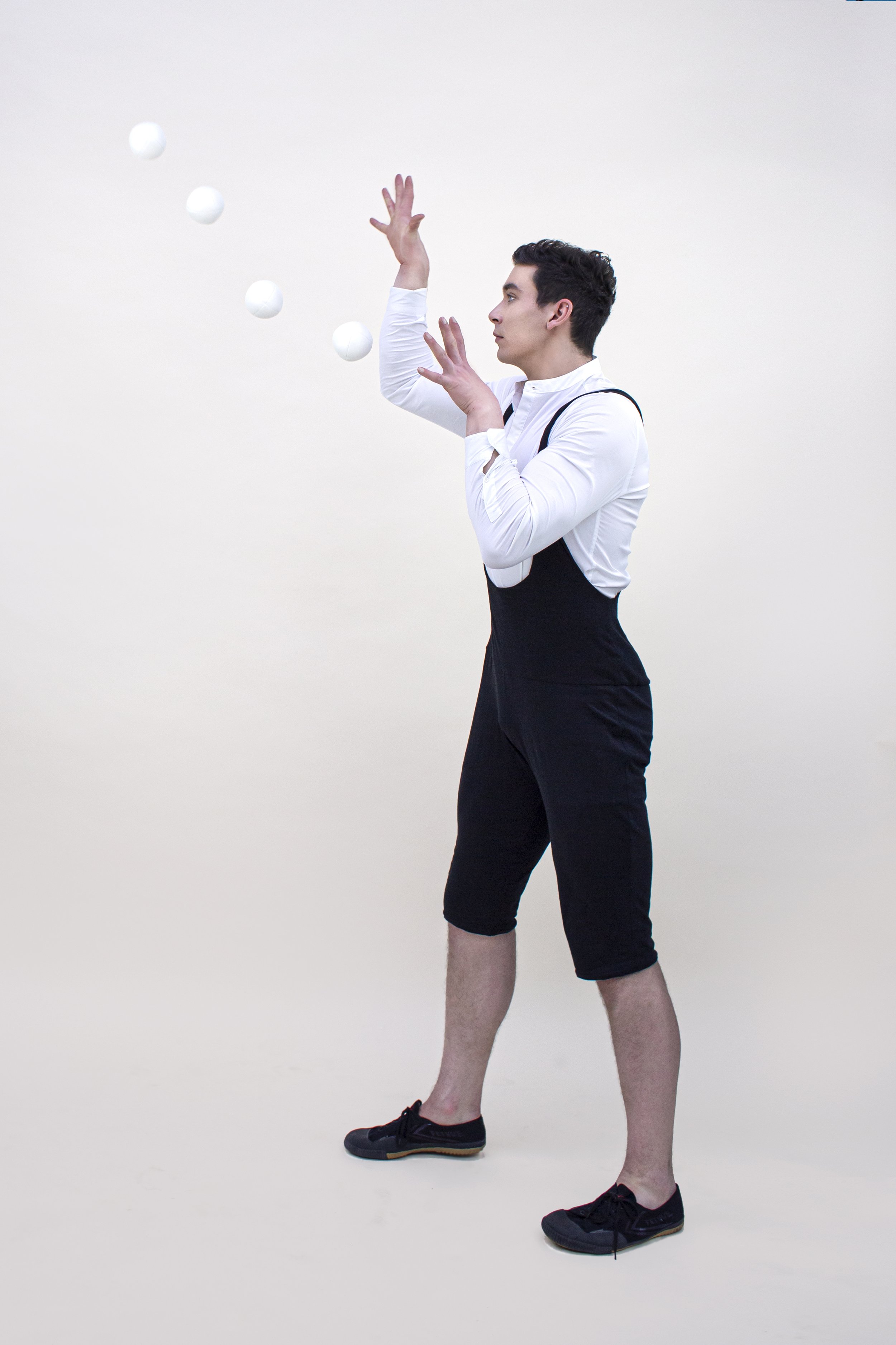 Mike Corr Circus performs his ball juggling act for a photoshoot