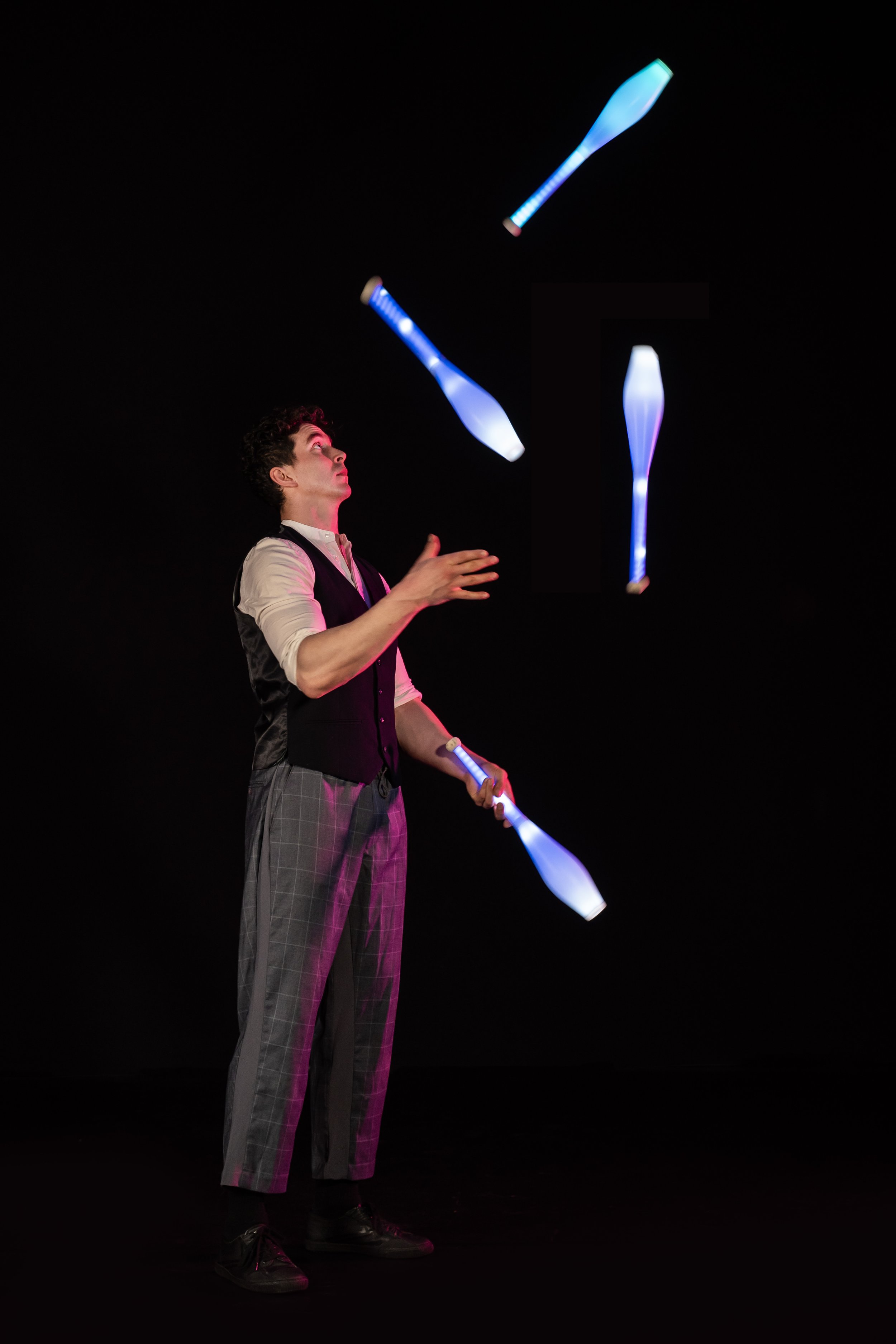 Mike Corr Circus juggles LED clubs, available for hire for private events