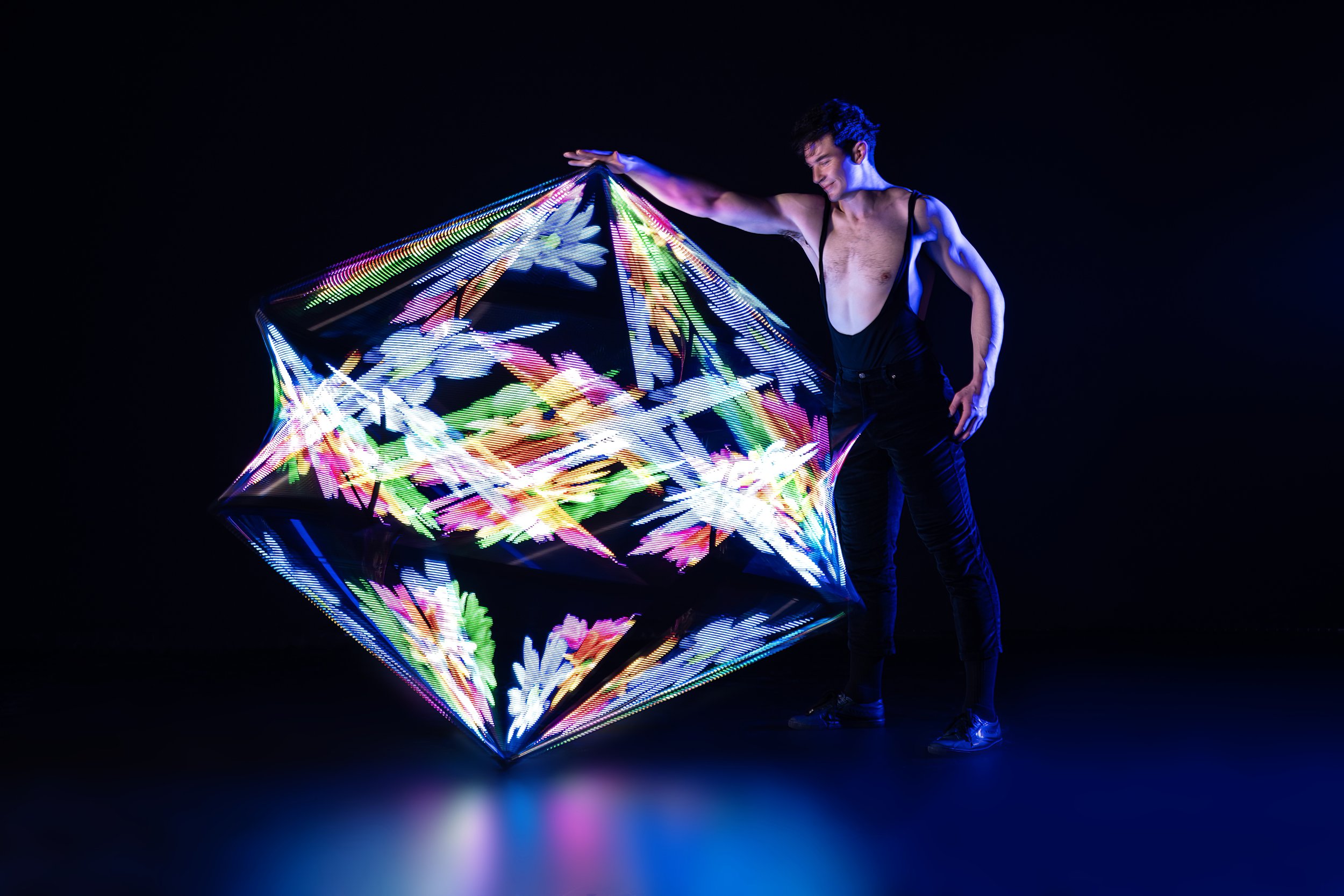 Mike Corr Circus performing LED Pixel Cube creating a beautiful image, for hire for events in the UK and worldwide