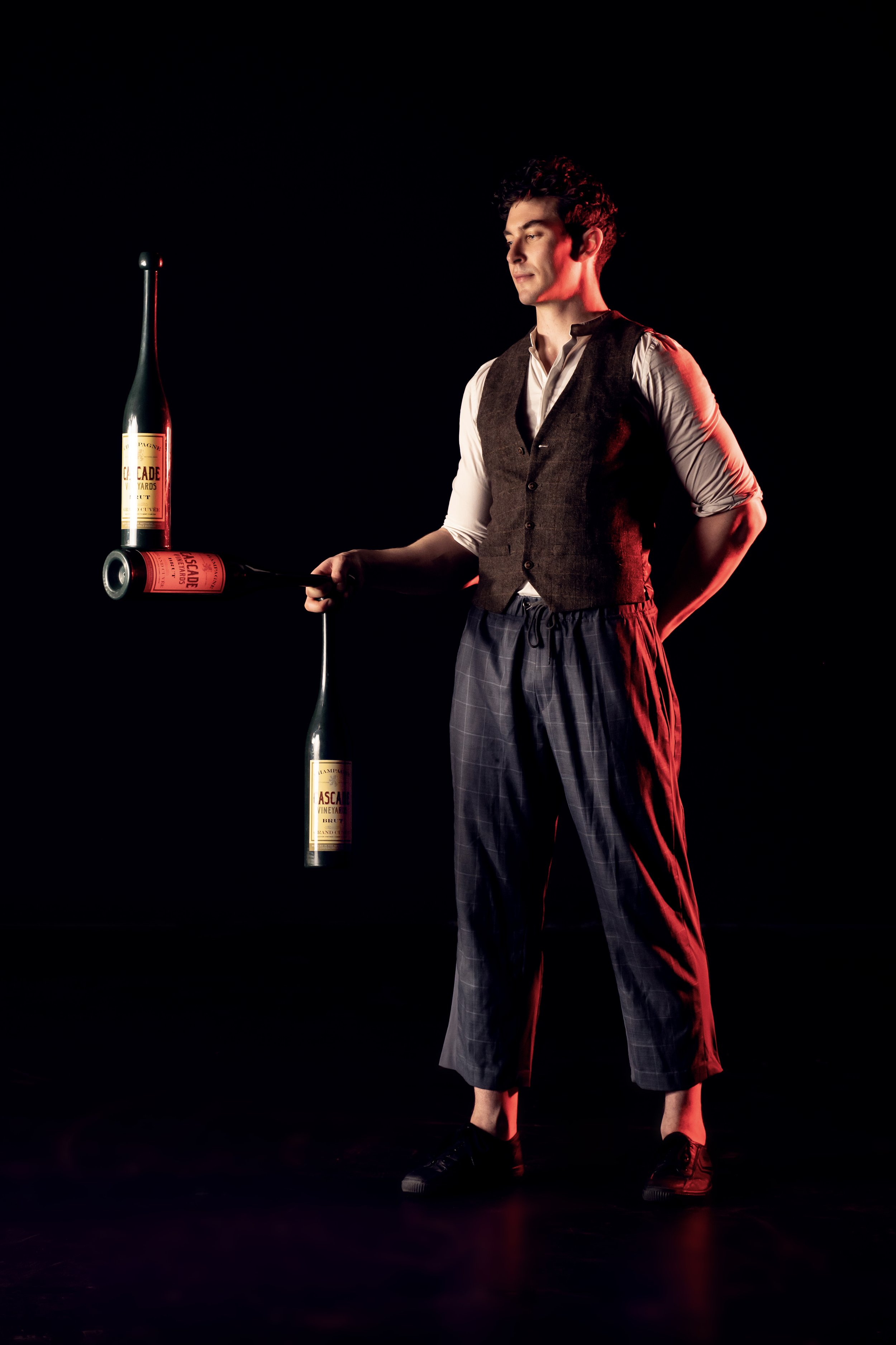 Mike Corr Circus balances champagne bottles in his bespoke juggling performance