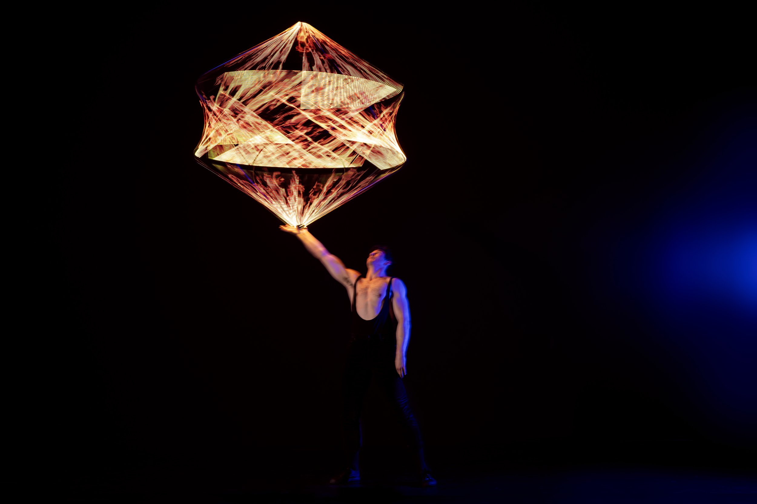 Mike Corr Circus performing LED Pixel Cube creating an incredible fire flame visual, for hire for events in the UK and worldwide