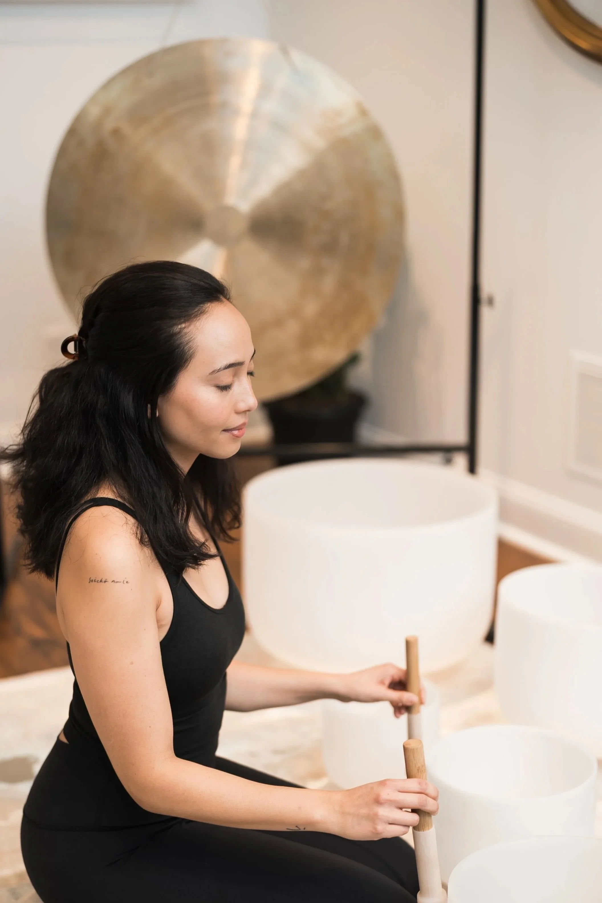 Sound bath in Berwyn PA led by Audrey Uchimoto using crystal singing bowls to support nervous system regulation