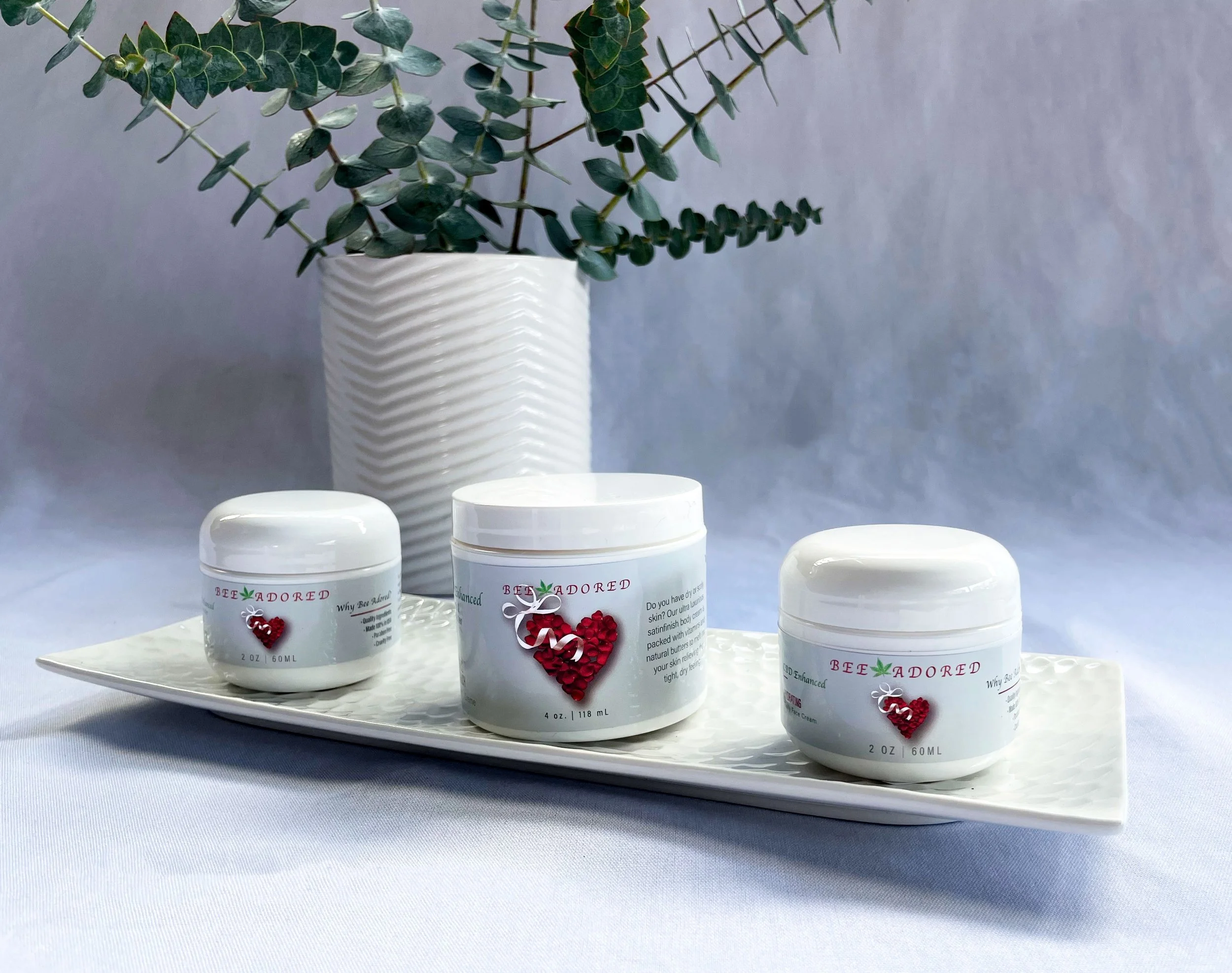 Three CBD skincare item on a tray