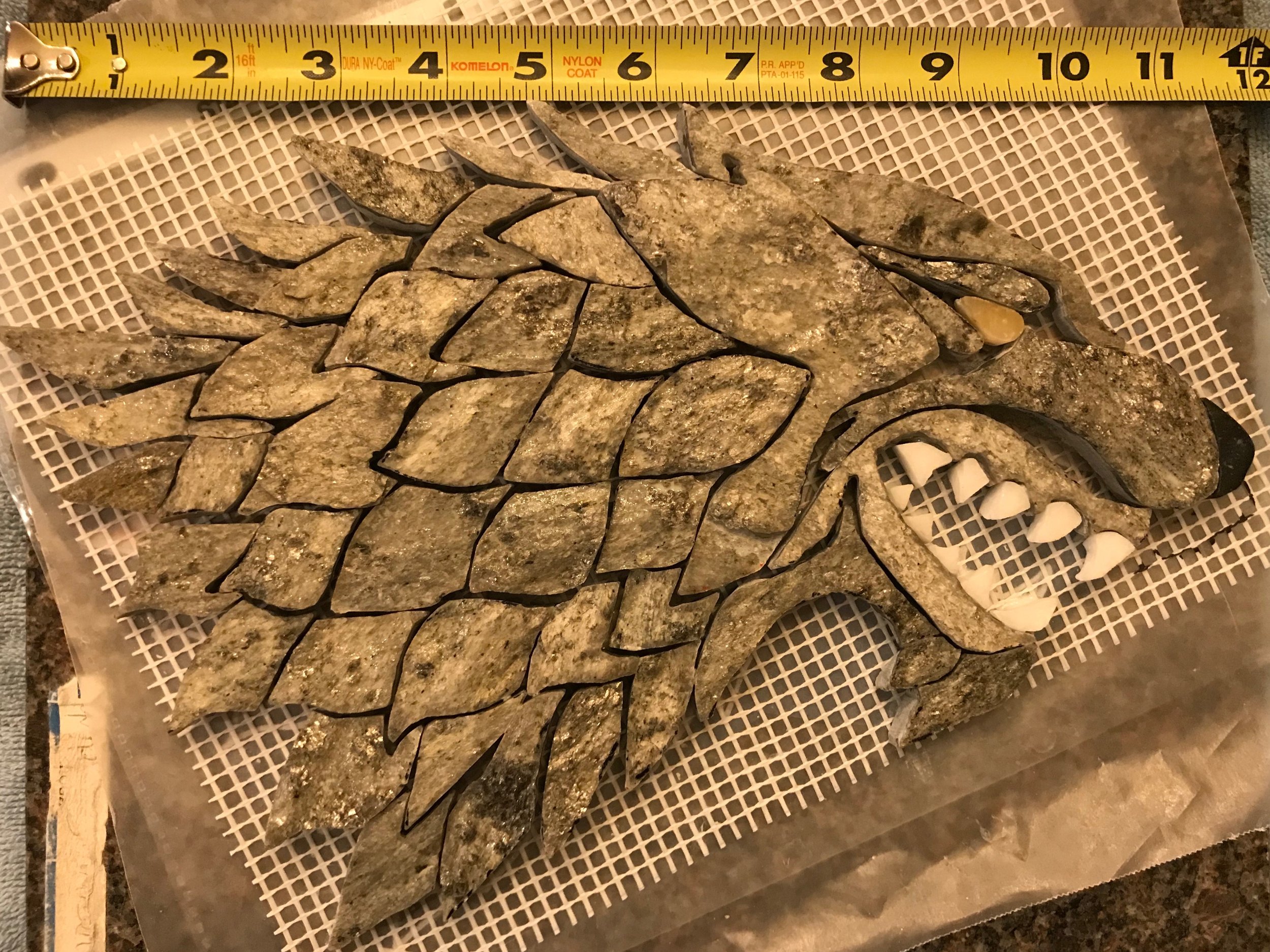 Using just a wet tile saw, each of the 58 pieces were methodically cut and fit together. While phyllite is a softer stone, easy to cut, it’s also a foliated metamorphic rock that often split into thin layers during the cutting and grinding of each pi