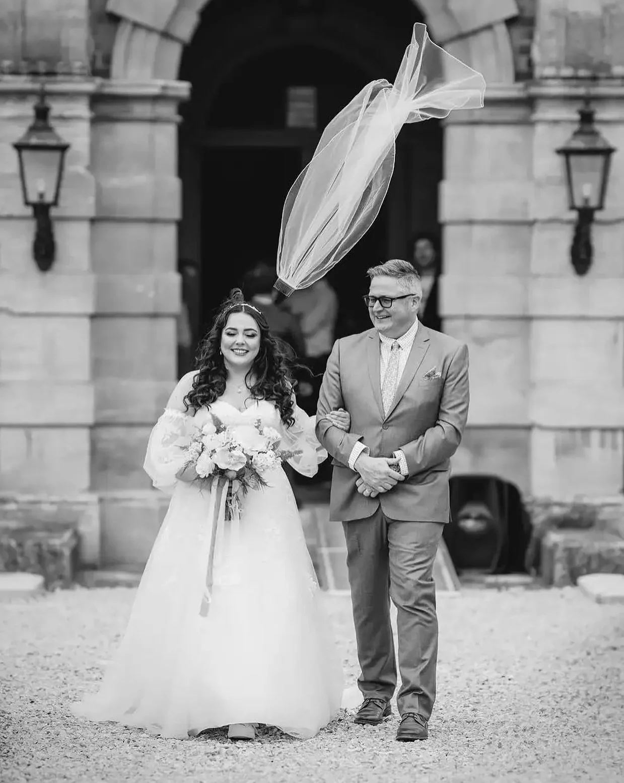 If you are holding your wedding in the UK, you know for sure that you can have 4 seasons in any one day. Max &amp; Rayna had a gale force wind for their outdoor wedding ceremony at Rossington Hall! Here&rsquo;s a photograph I captured of Rayna&rsquo;