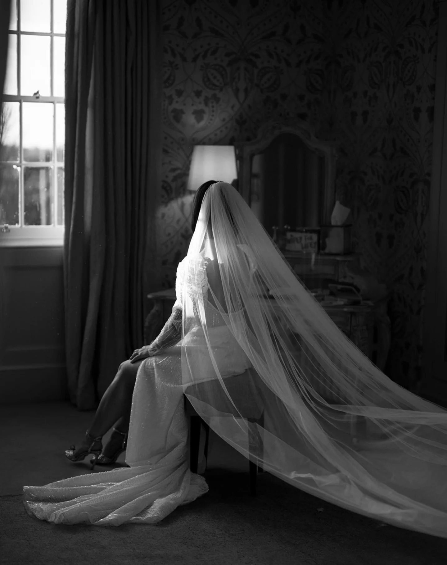 Lyndsey collecting her thoughts minutes before she said &lsquo;I do&rsquo; to Berkley 💕 @hodsock.priory @lynzwheelsmcquaid 
.
.
.
.
#hodsockpriorywedding #hodsockpriory #winterweddinginspiration #documentaryweddingphotographer #nottinghamshireweddin