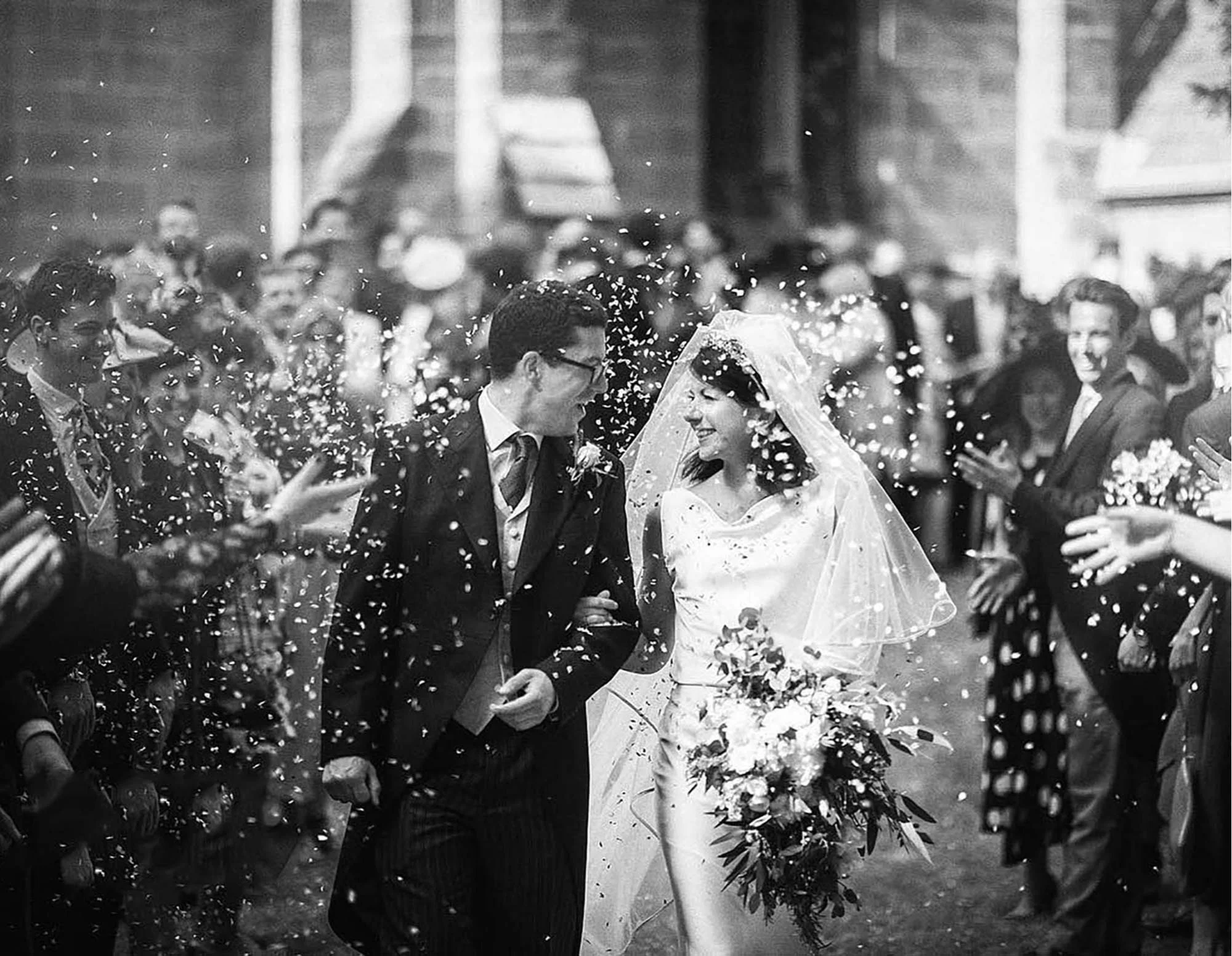 yorkshire wedding photographer - confetti photograph of bride and groom Rise Hall