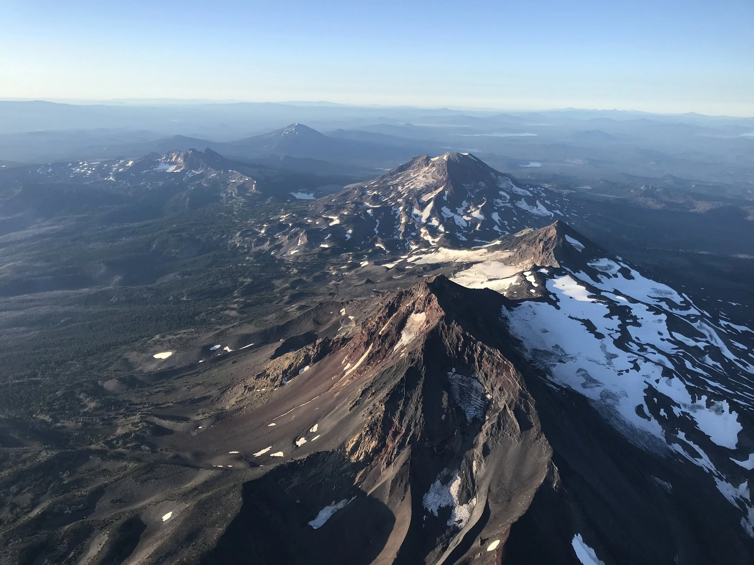 Three Sisters mountain range pictured from 12,000ft