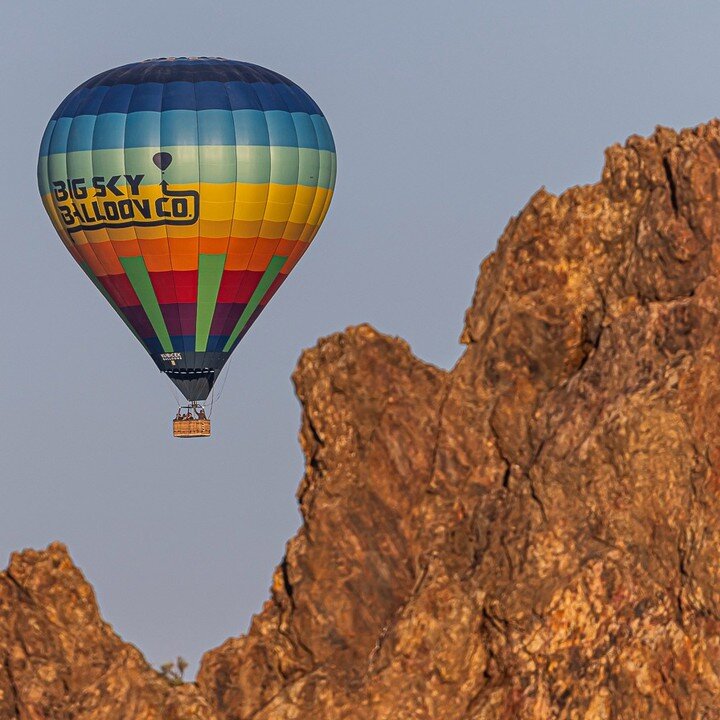 Check out our balloon next to this awesome mountain! #HotAirBalloon #BigSkyBalloonCo 🎈⛰️