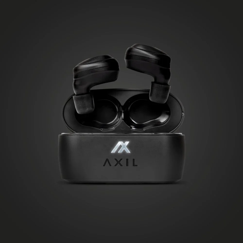 AXIL XCOR Pro earbuds lifting out of their open charging case