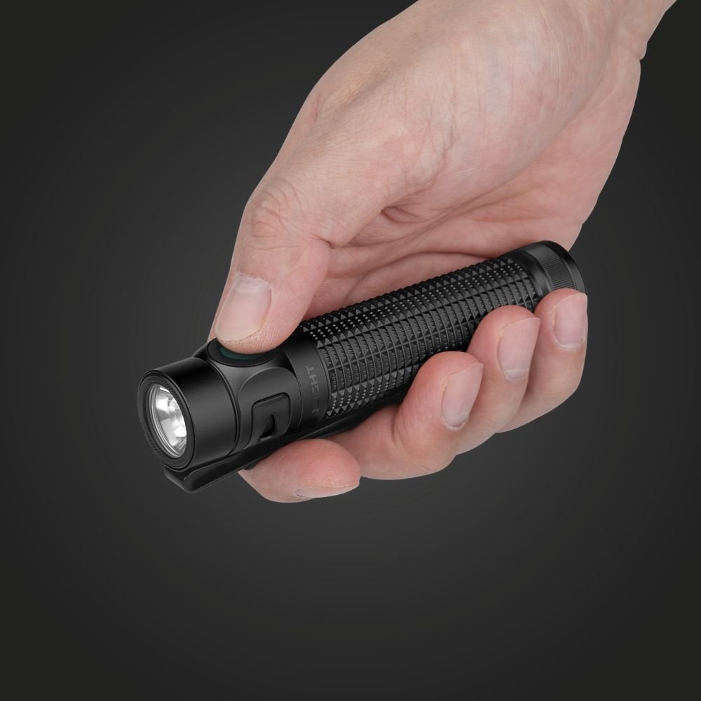 Olight Baton 4 Pro held in hand to show size