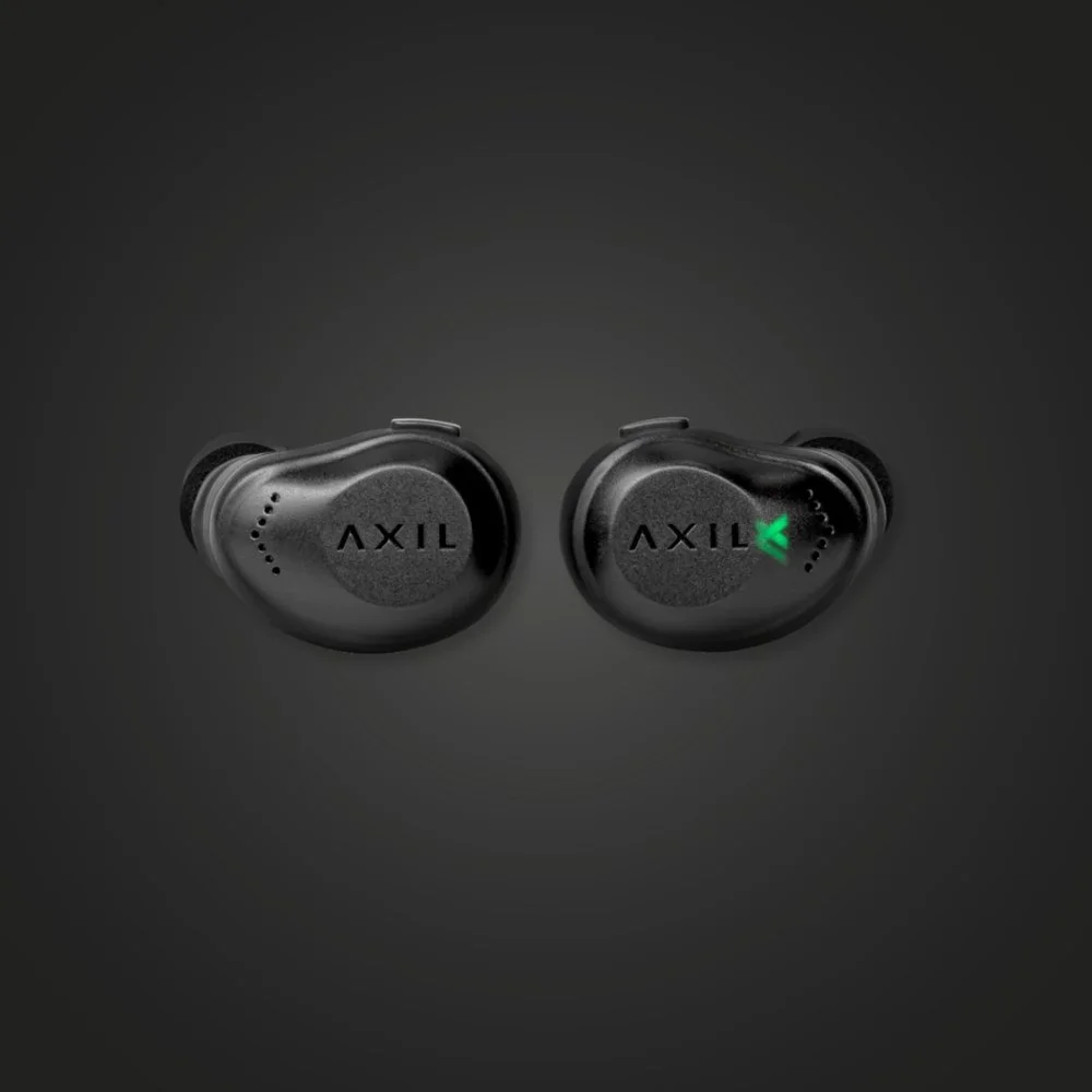 Pair of AXIL XCOR Pro earbuds showing the low-profile design