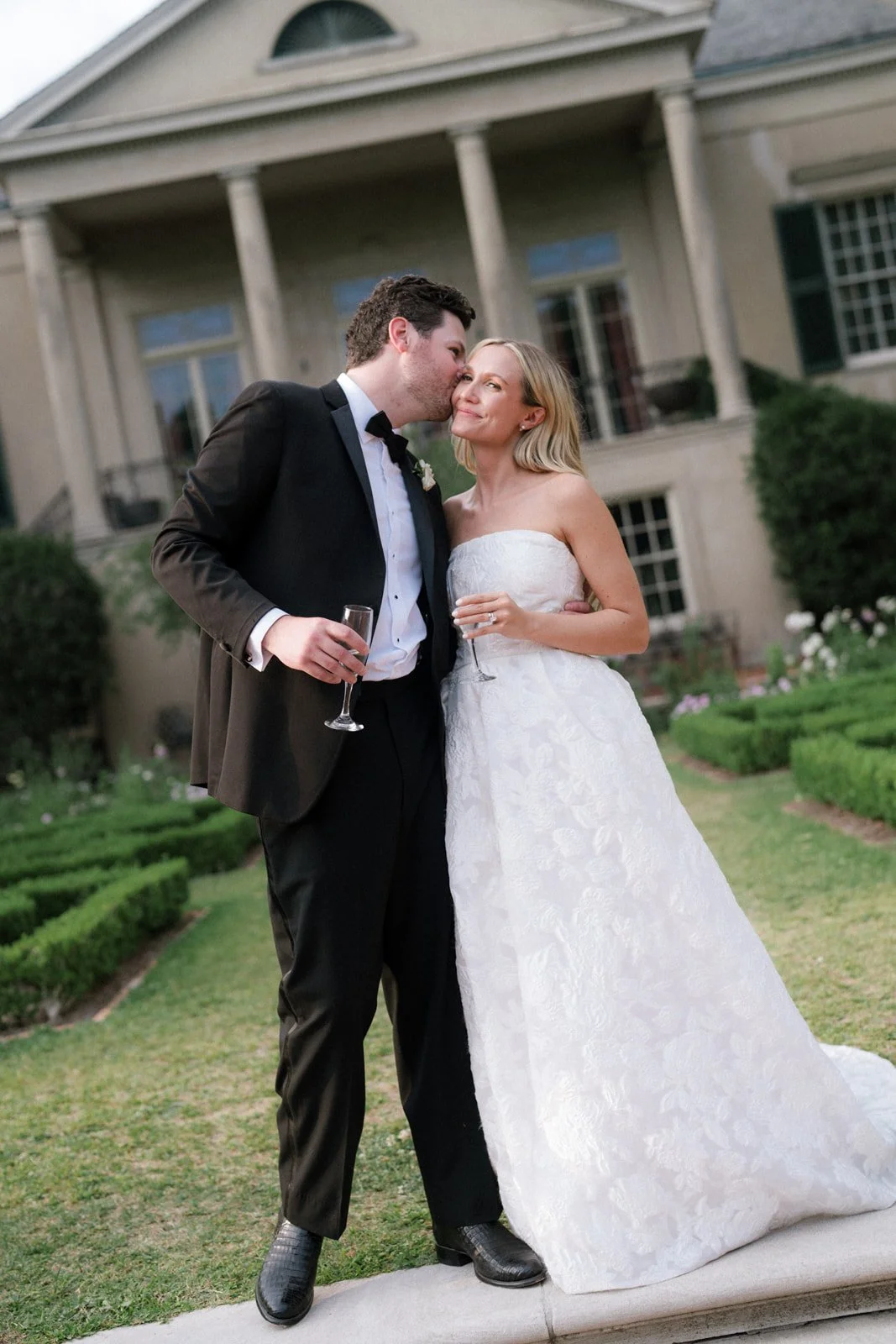 cocktail hour with bride and groom during spring outdoor wedding