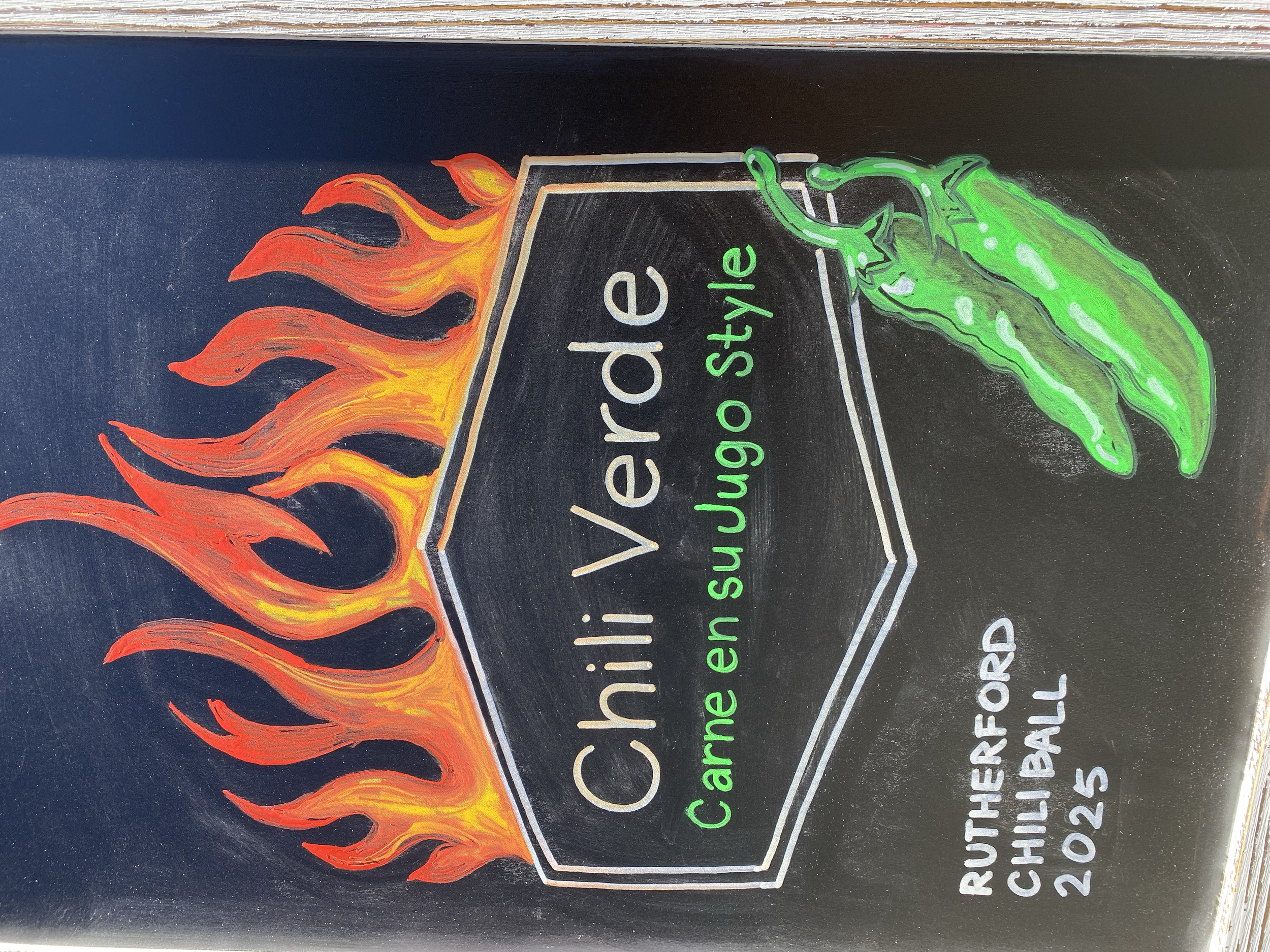 detail photo of hand illustrated chalk art-flames and 2 roasted green peppers-Chili Verde Carne en su Jugo Style